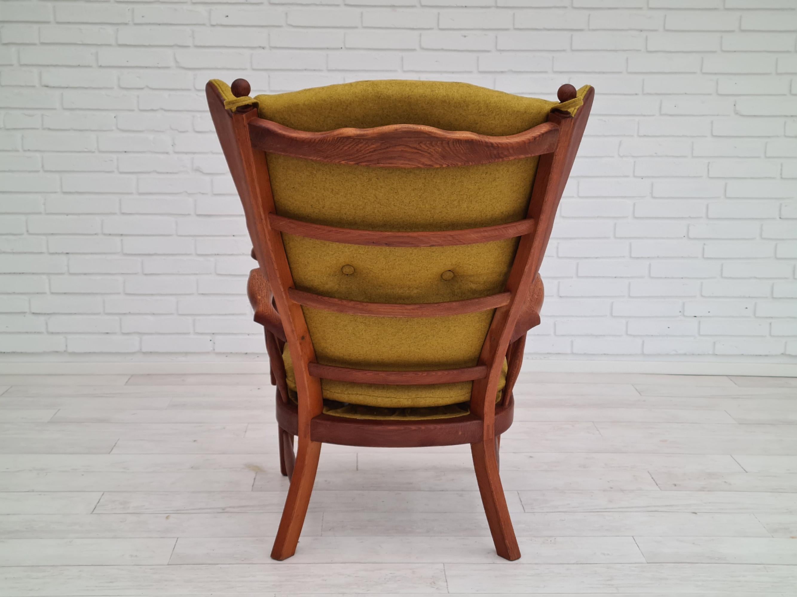 60s, reupholstered Danish high-backed ear flap chair, solid oak, furniture wool 1