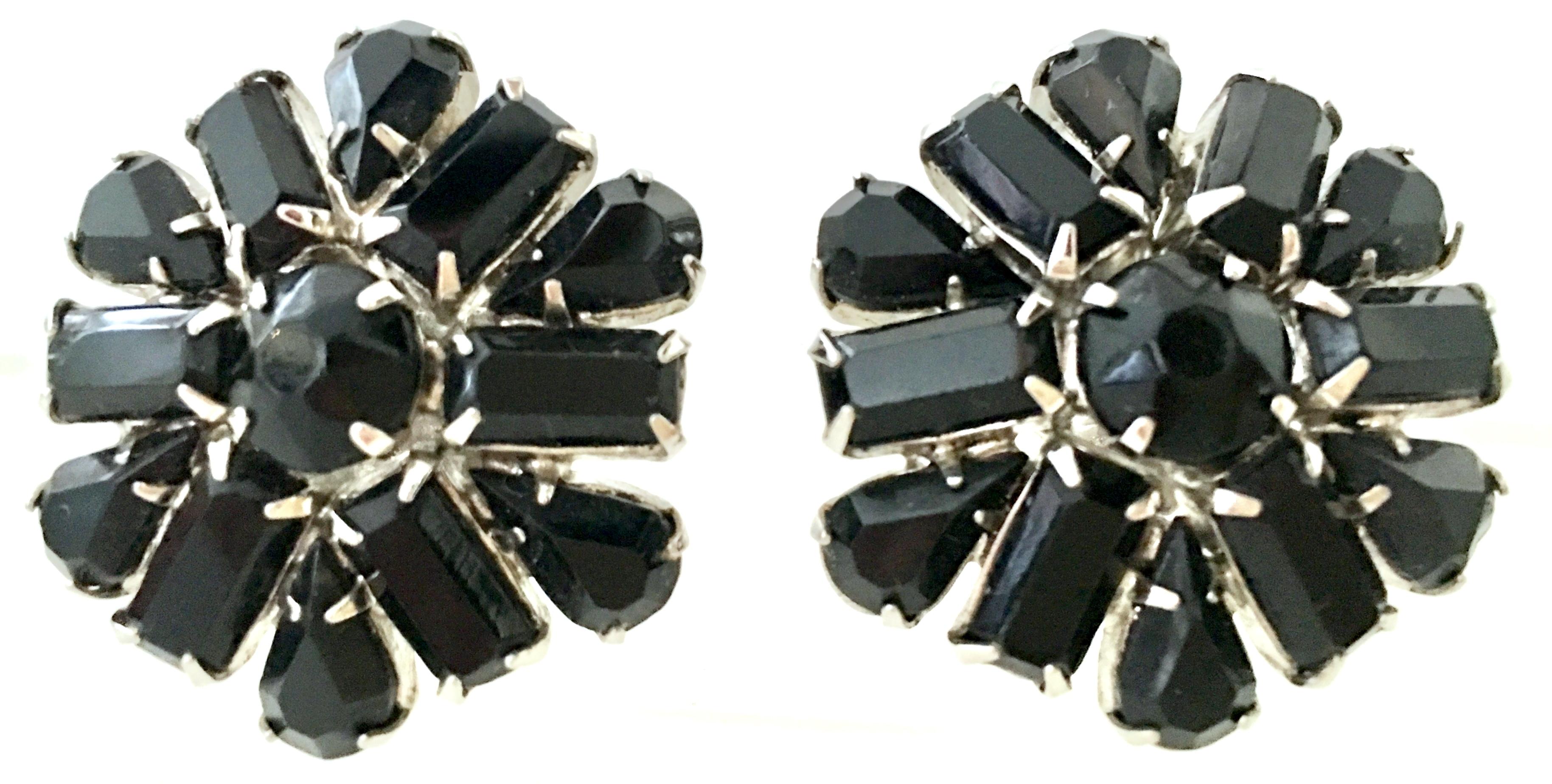 1960'S Silver Rhodium Plated Prong Set Black Molded Faceted Glass Clip Style Earrings By, Weiss. Each earrings is signed on the underside, Weiss.