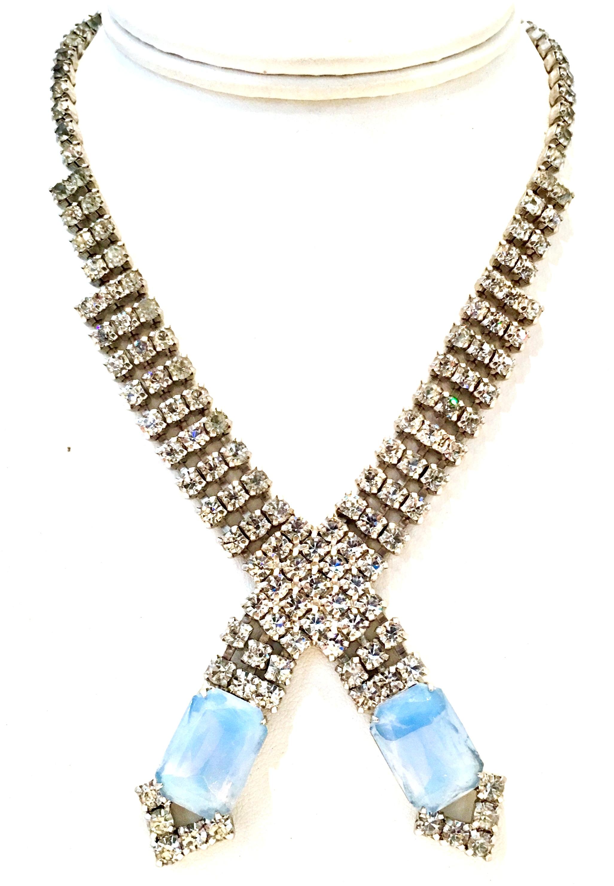 1960'S Silver Rhodium Plate With Brilliant Crystal Clear Swarovski Paste Set & Blue Faceted Glass Moonstone Choker Style Necklace. This incredible piece has a simple adjustable hook closure. Each moonstone is approximately .75