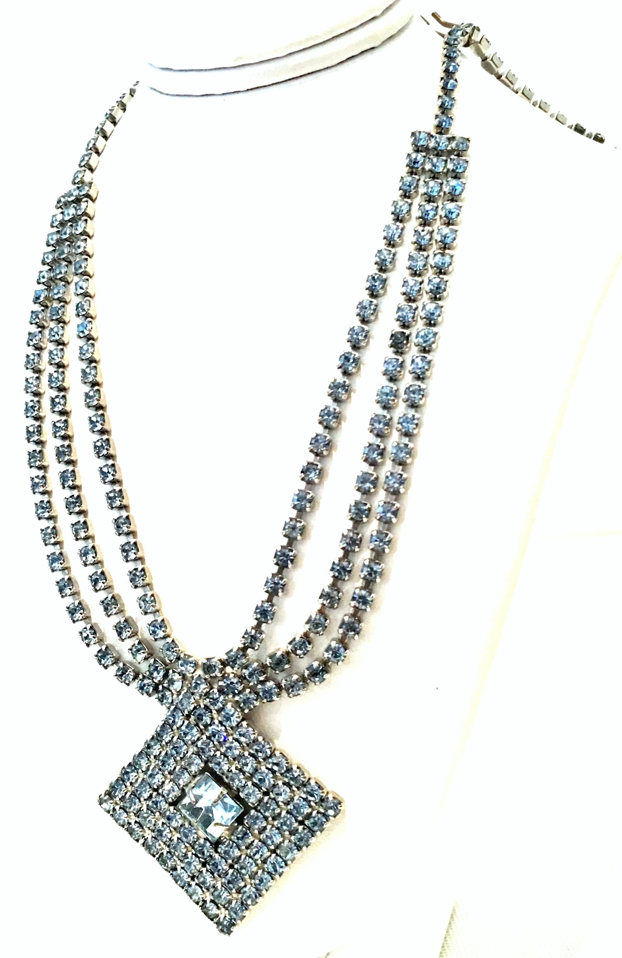 20th Century Monumental Art Deco Style Silver & Blue Sapphire Triple Row Pendant Choker Style Necklace. Features three rows of brilliant prong set blue sapphire cut and faceted stones set in silver rhodium plate with a 2