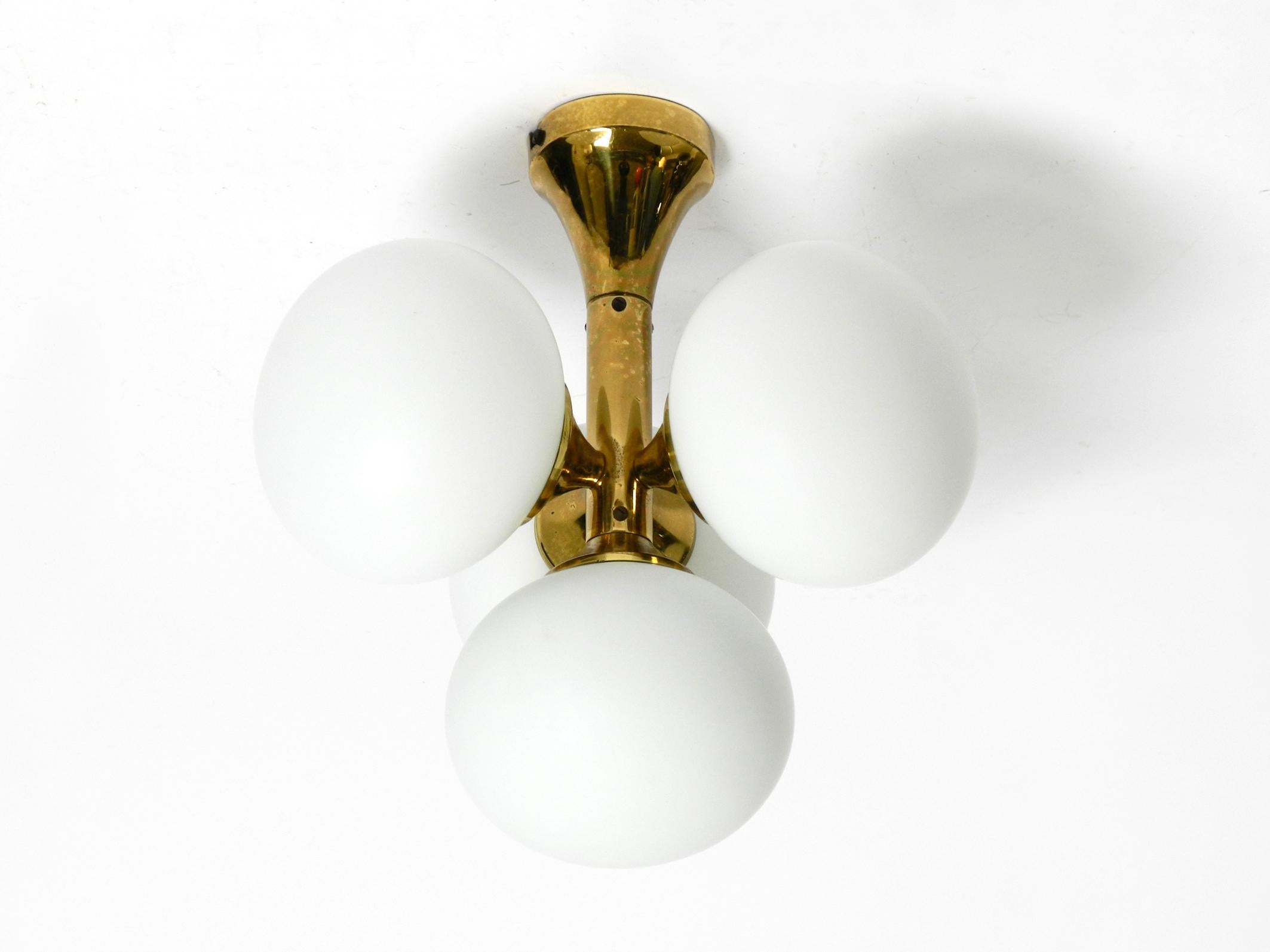 60s Space Age Kaiser Leuchten brass ceiling lamp with 4 white oval glass spheres For Sale 10