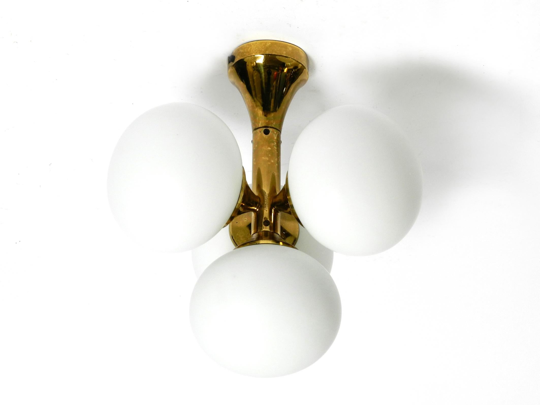 60s Space Age Kaiser Leuchten brass ceiling lamp with 4 white oval glass spheres For Sale 12
