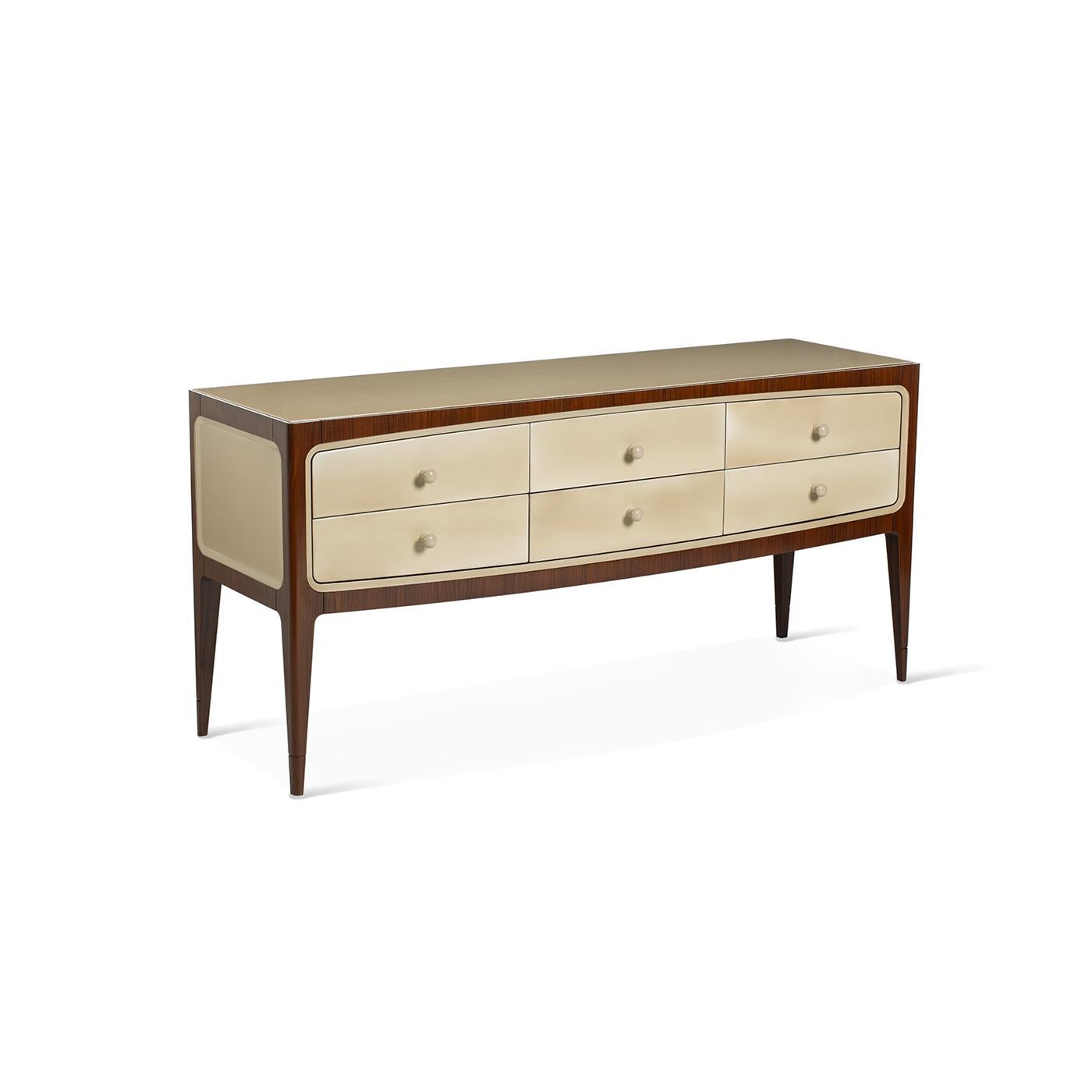 A sideboard with drawers with the classic style of the 60s. In total it has 5 drawers sliding on metal guides and 1 folding desk in the center. The structure is in beechwood and rosewood veneering, while the front, the top, and the sides are made in