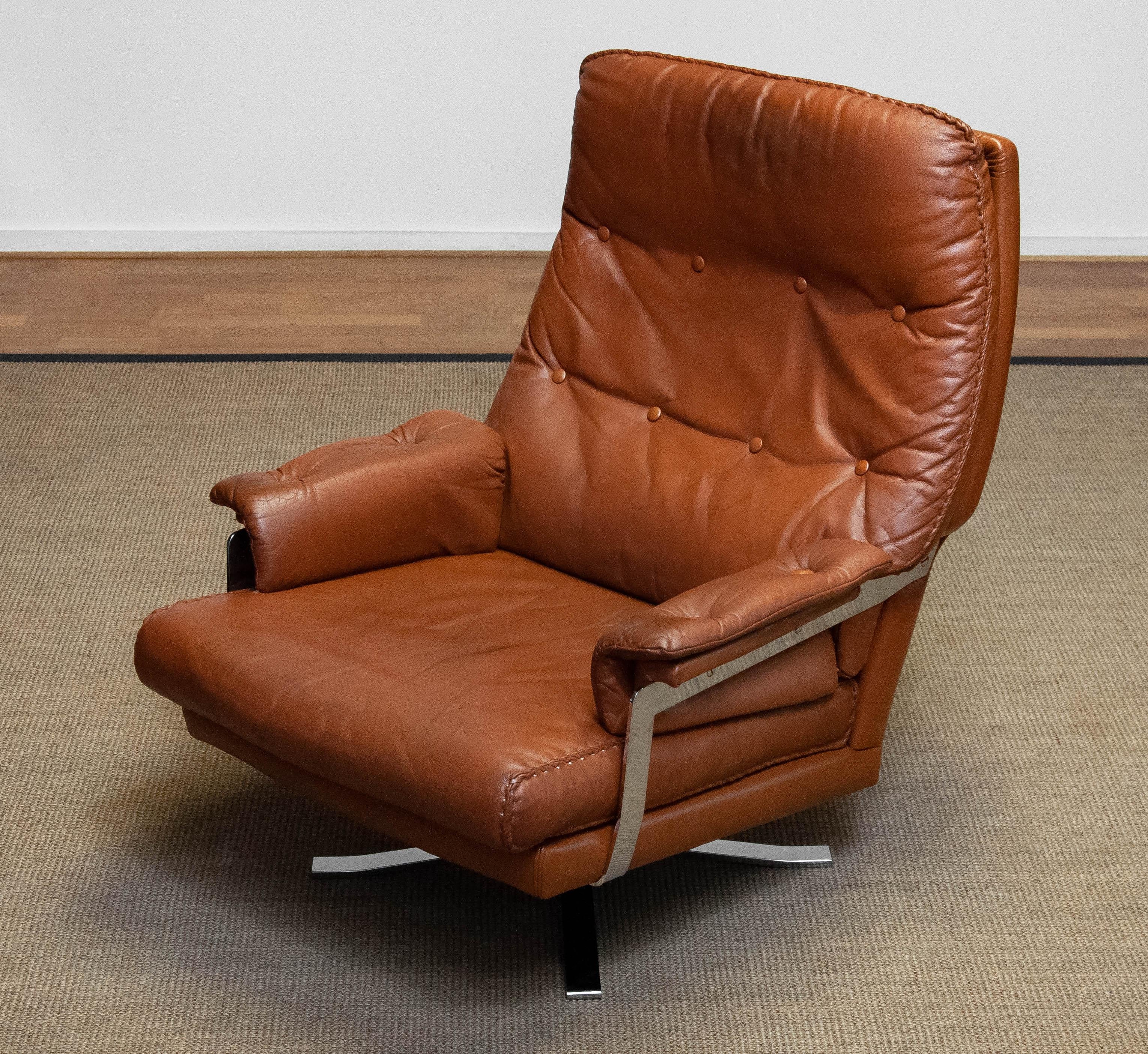 Modern 60s Tan Brown Handstitched Leather Swivel Chair by Arne Norell for Vatne Norway For Sale
