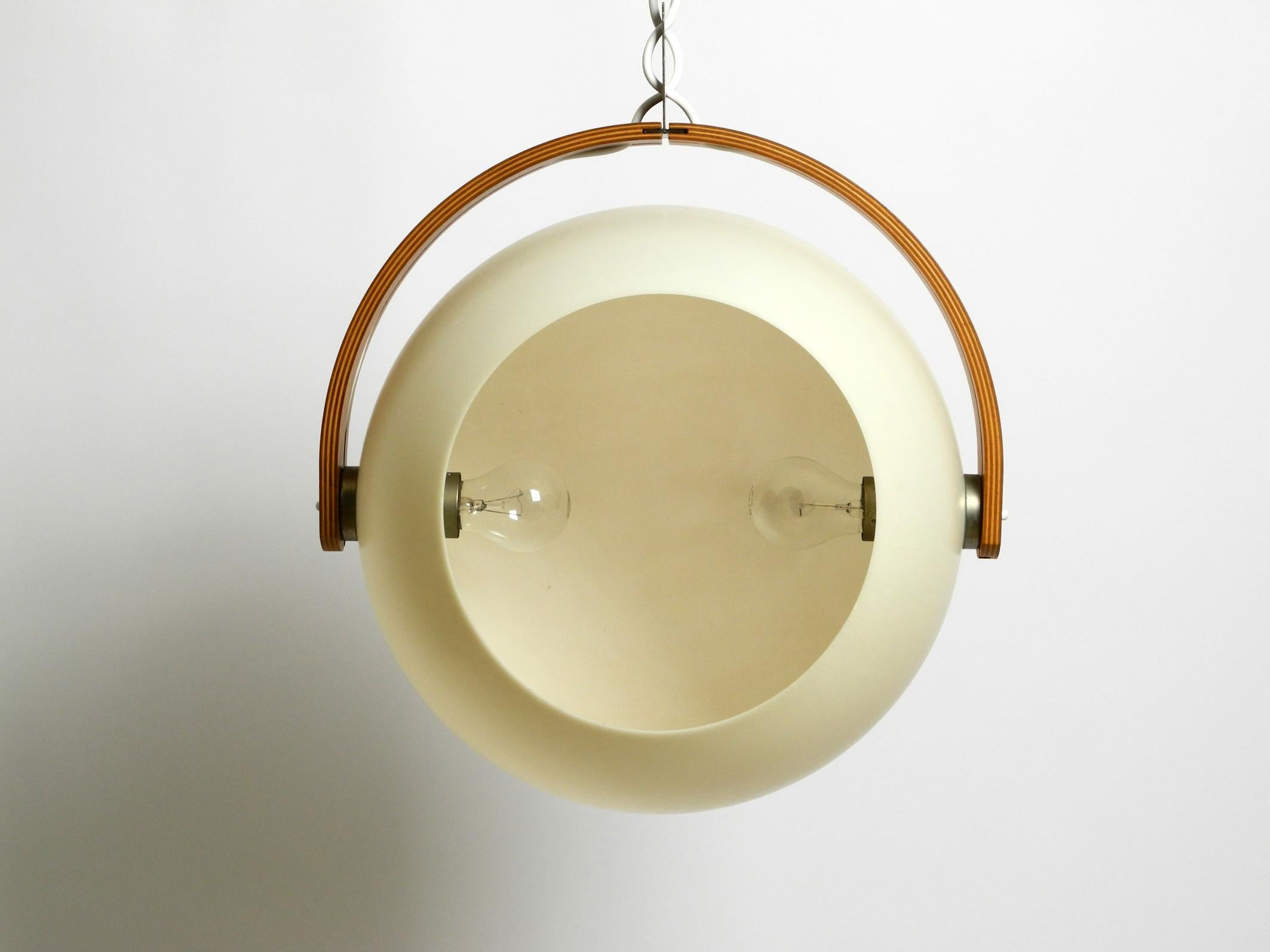 European 60s Temde Space Age pendant lamp with teak plywood and a sperical lampshade For Sale