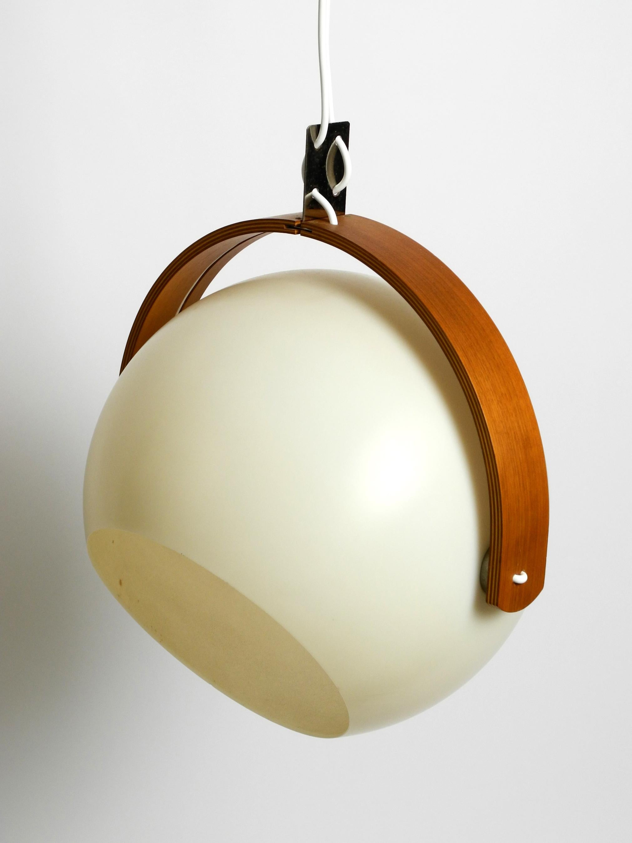 Plastic 60s Temde Space Age pendant lamp with teak plywood and a sperical lampshade For Sale