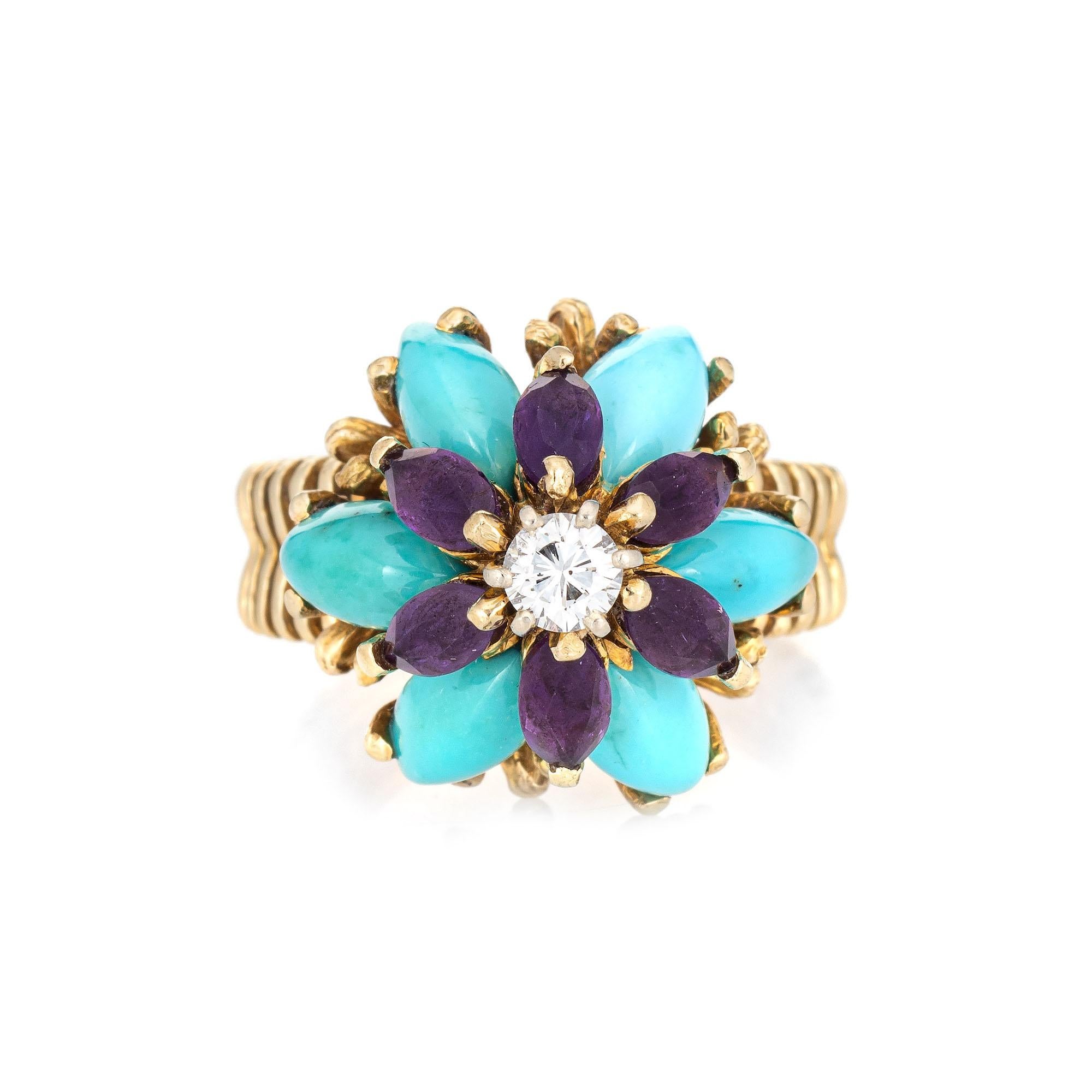 Stylish vintage turquoise & amethyst, diamond ring crafted in 14 karat yellow gold (circa 1960s). 

Round brilliant cut diamond is estimated at 0.35 carats (estimated at H-I color and SI2 clarity). Cabochon cut turquoise measures 9mm x 4mm
