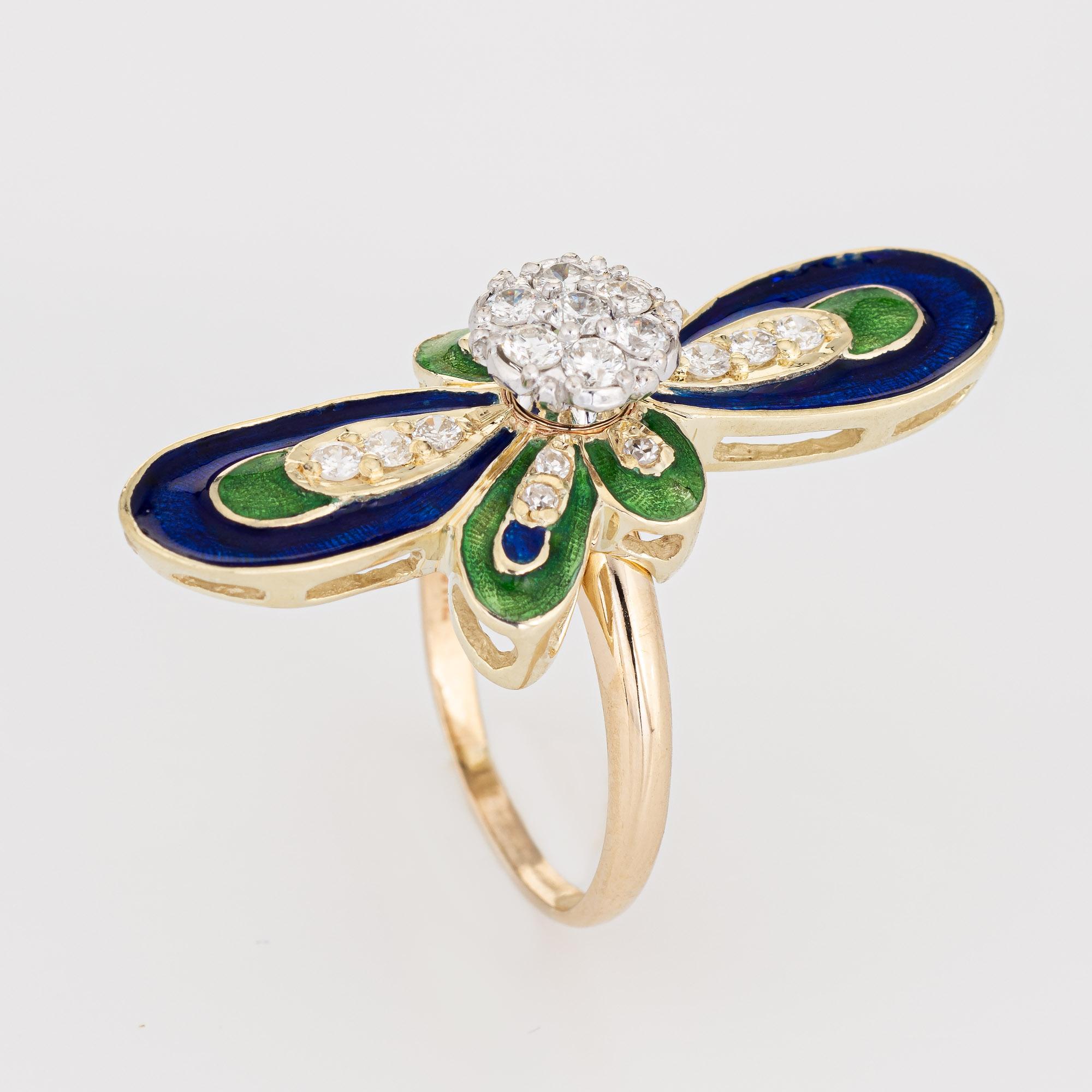 Stylish vintage diamond & enamel ring (circa 1960s) crafted in 14 karat yellow gold. 

Round brilliant cut diamonds total an estimated 0.45 carats (estimated at I-J color and VS2-SI2 clarity). 

The bold and groovy ring highlights bright and lively