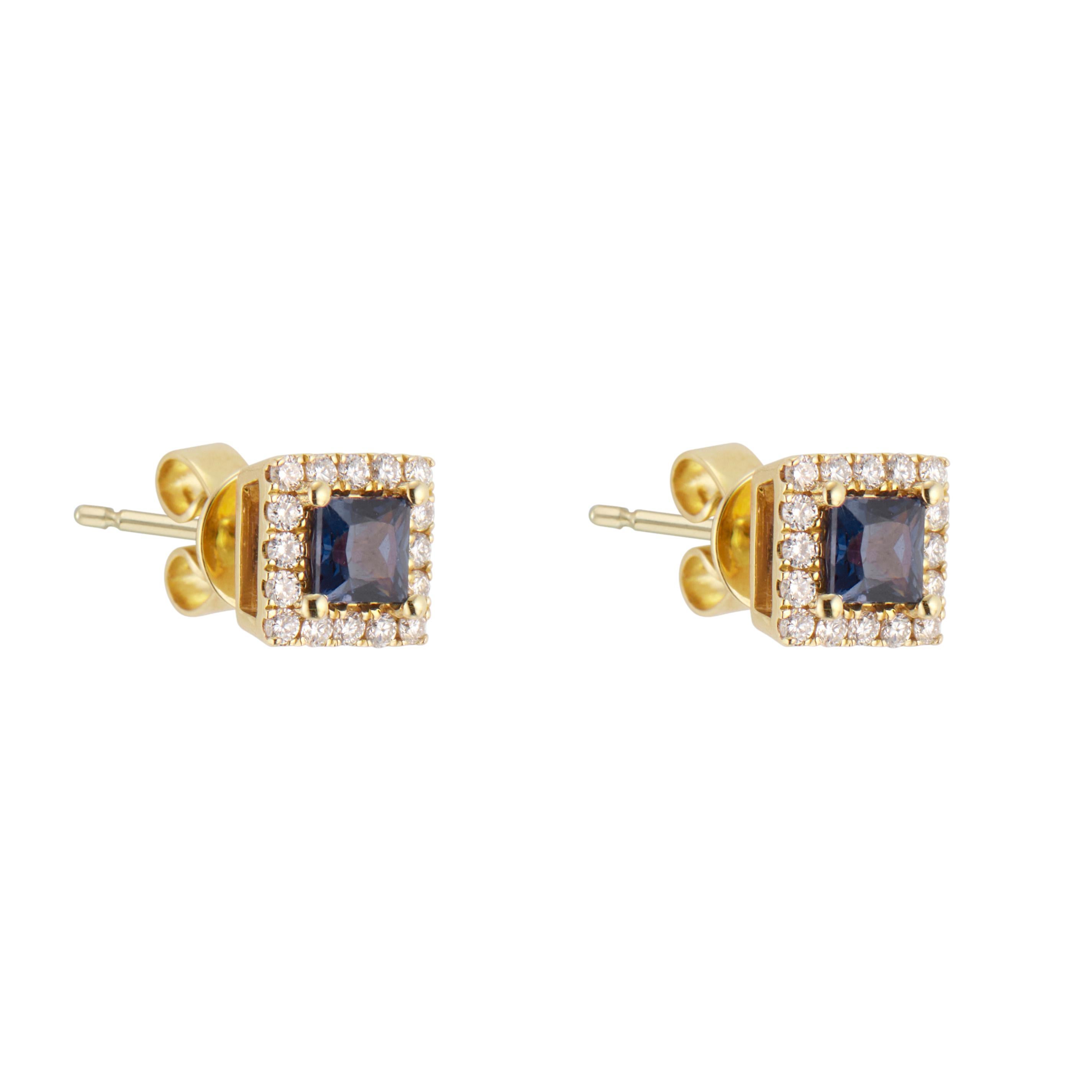 Sapphire and diamond stud earrings. 2 square cut sapphires, each with a halo of round brilliant cut diamonds, wet in 14k yellow gold. 

2 square blue sapphire, approx. .61cts
30 round brilliant cut diamonds, approx. .23cts
14k yellow gold 
Stamped: