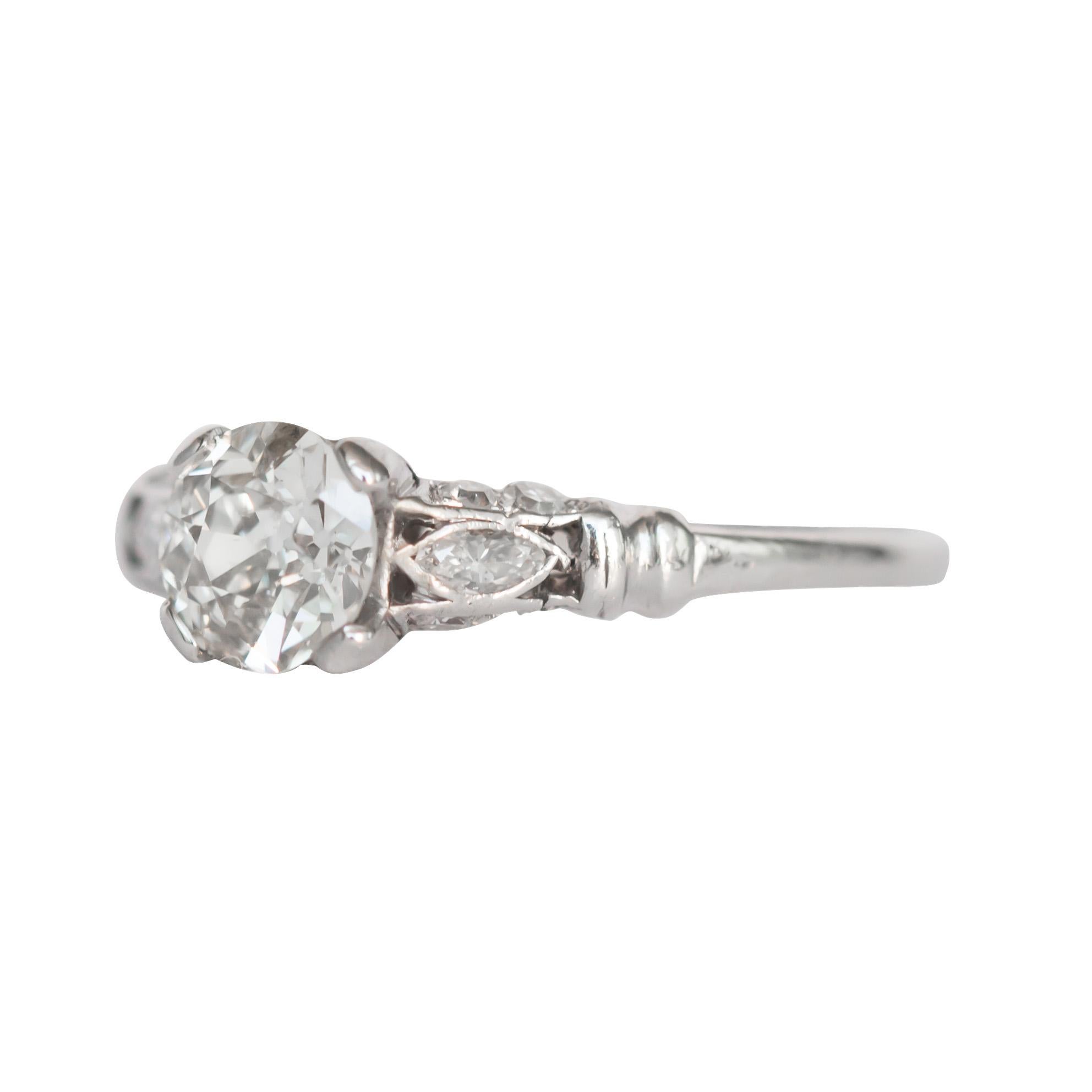 Item Details: 
Ring Size: 6.75
Metal Type: Platinum [Hallmarked, and Tested]
Weight: 2.5 grams

Center Diamond Details:
Weight: .61 carat
Cut: Old European Brilliant
Color: K
Clarity: VS2

Side Diamond Details:
Weight: .25 carat, total weight
Cut: