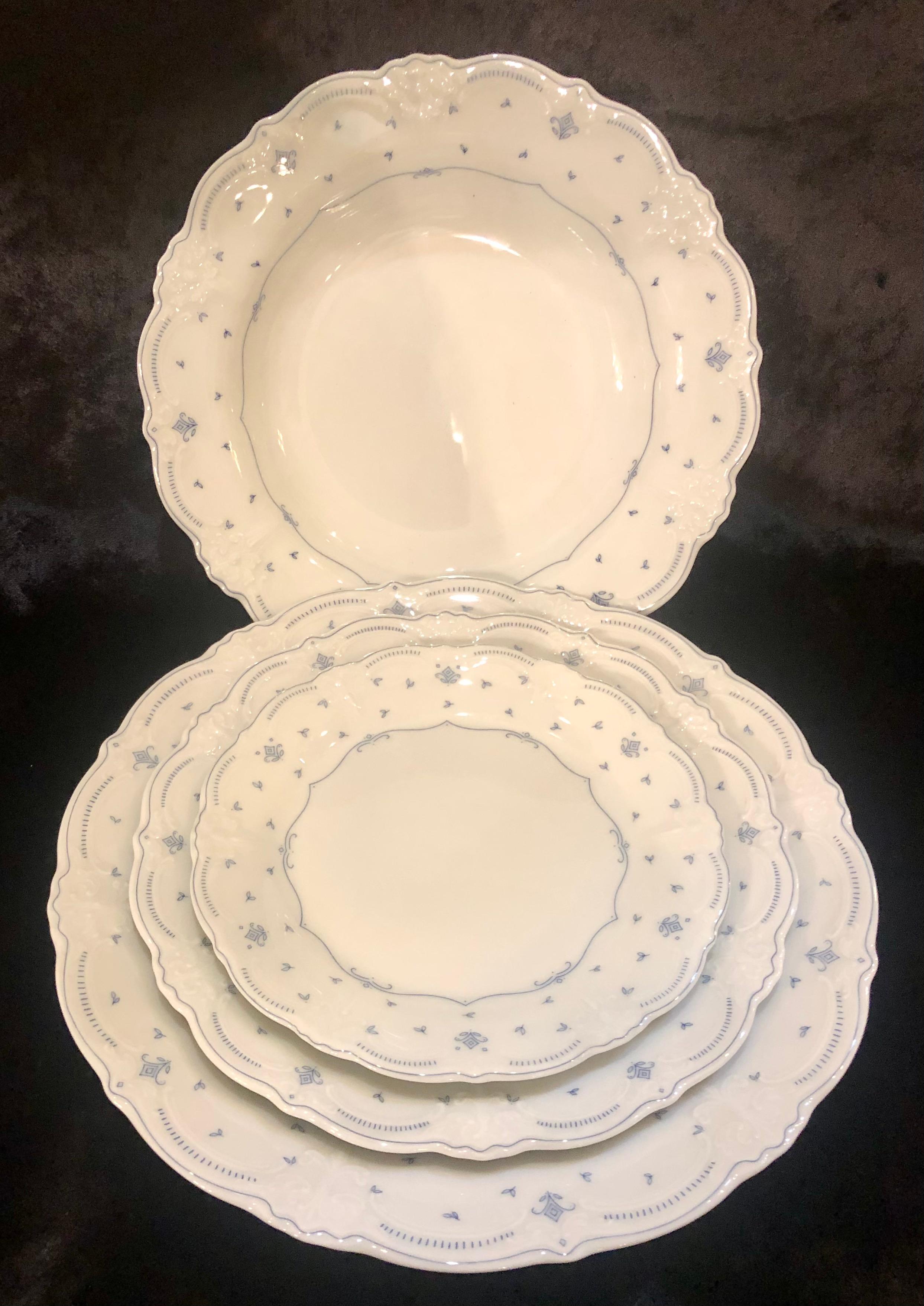 61 pieces Hutschenreuther Porcelain dinner set, Germany, 1814. Fleur De Lis Blue by Tirschenreuth in a bone white and celeste blue finish. This impossible to find dinner set is in lovely condition and ready to impress in any setting. Complete