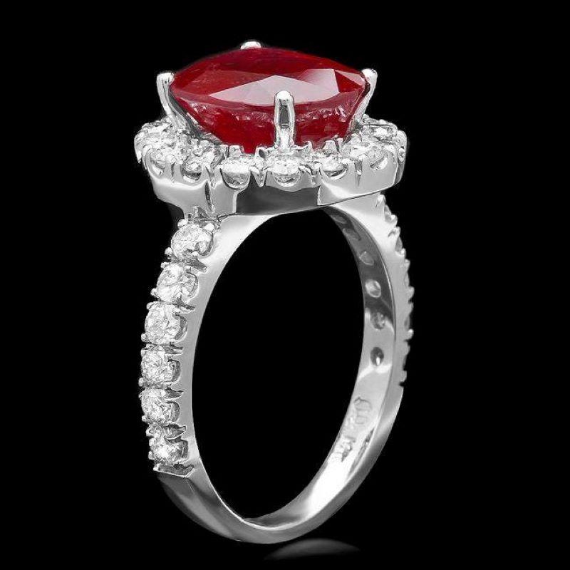 6.10 Carats Natural Red Ruby and Diamond 14K Solid White Gold Ring

Total Red Ruby Weight is: Approx. 4.90 Carats

Ruby Measures: Approx. 11.00 x 9.00mm

Ruby treatment: Fracture Filling

Natural Round Diamonds Weight: Approx. 1.20 Carats (color G-H