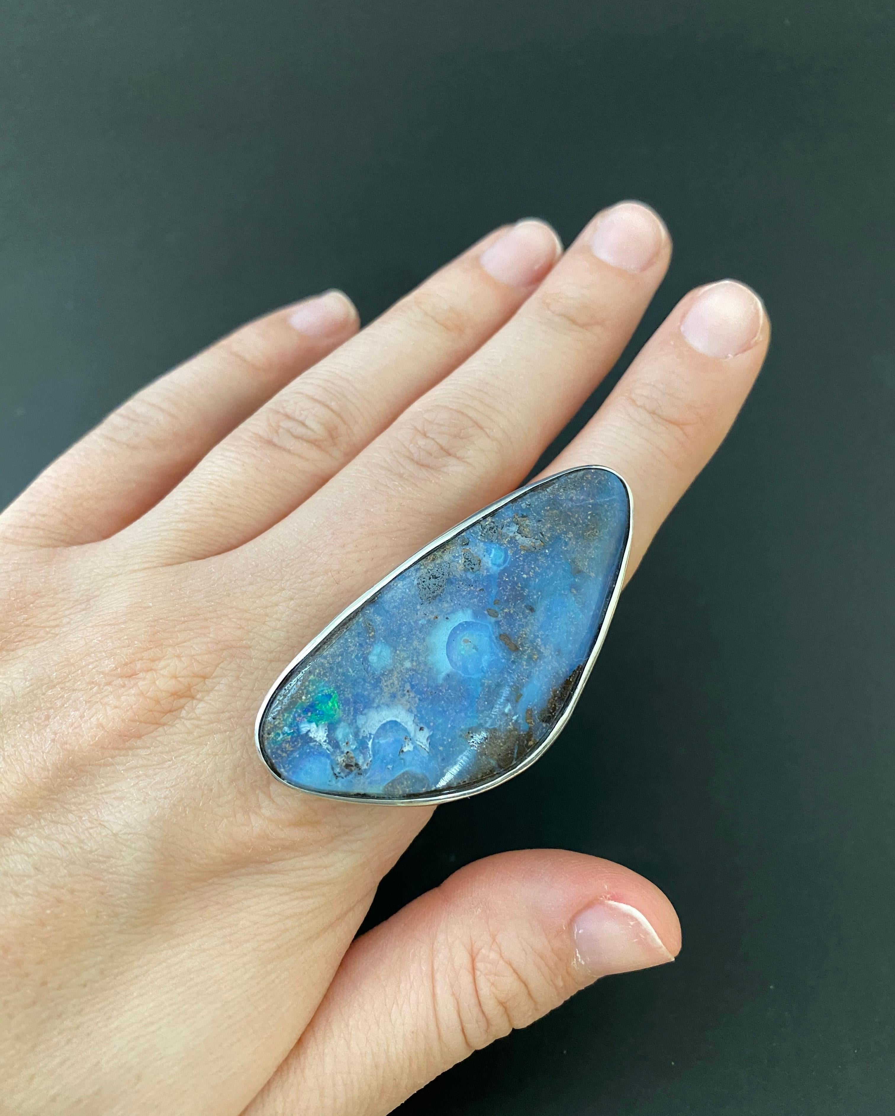 Material: Silver
Gemstone: 1 Opal at 61.03 Carats.
Ring Size: 8 Alberto offers complimentary sizing on all rings.
This piece measures approximately 50 x 26 millimeters.

Fine one-of-a-kind craftsmanship meets incredible quality in this breathtaking