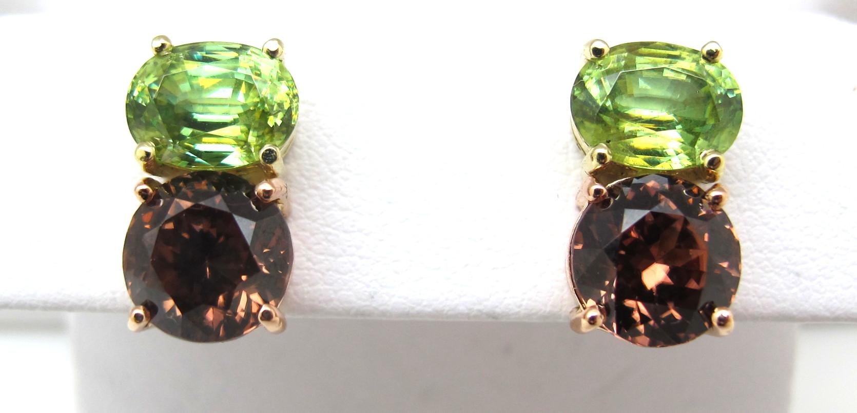 This tropical color pairing is brilliantly bright! Two lime green color sphenes are paired with two passionfruit color rose zircons. Both zircons and sphenes are two of the most brilliant gemstones found in nature due to their exceptional