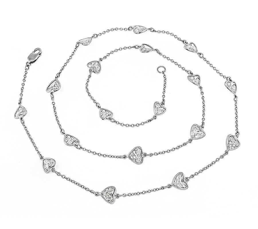 This is a magnificent platinum by the yard necklace. The necklace is set with sparkling heart shape diamonds that weigh approximately 6.11ct. The color of these diamonds is H-J with VS1-SI2 clarity. The necklace measures 19 inches in length and