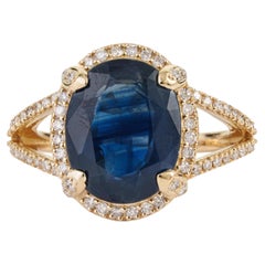 6.11ct Oval Cut Blue Sapphire Diamond Split-Shank Halo Ring in 14K Yellow Gold