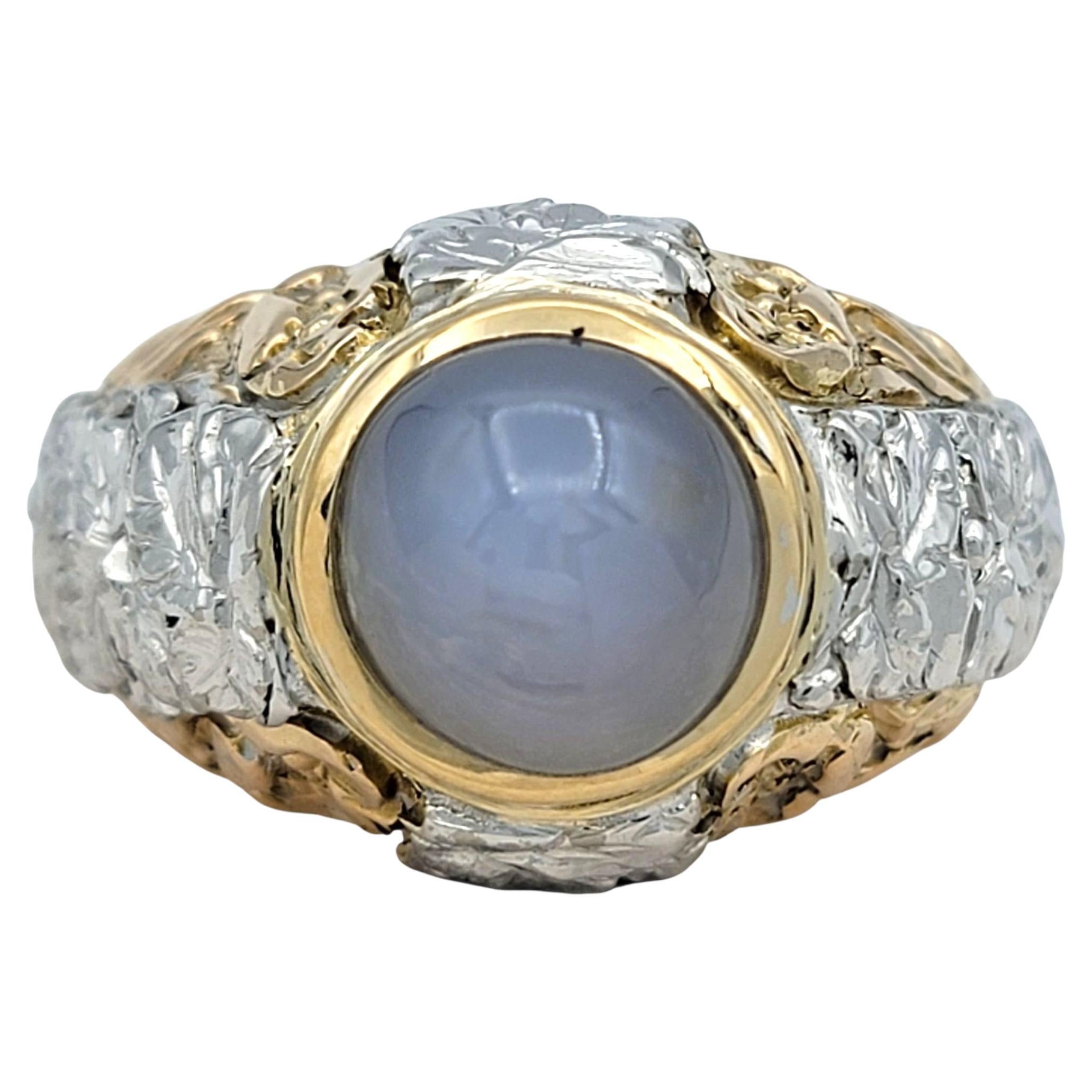 Bague saphir étoilé cabochon de 6,12 carats en or tricolore 18 carats avec chaton