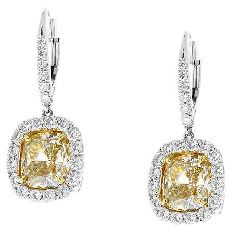 6.12ctw Fancy Yellow and 1.13ctw Diamond Earrings in Platinum