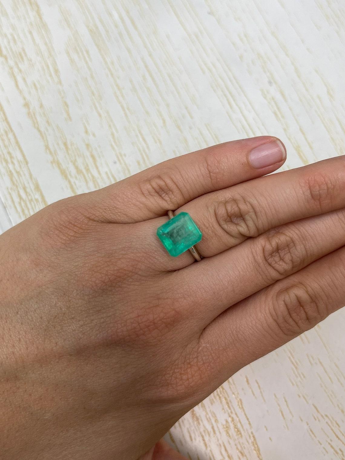 6.13 Carat 11.5x10.3 Earthy Pastel Green Colombian Emerald - Emerald Cut May For Sale 2