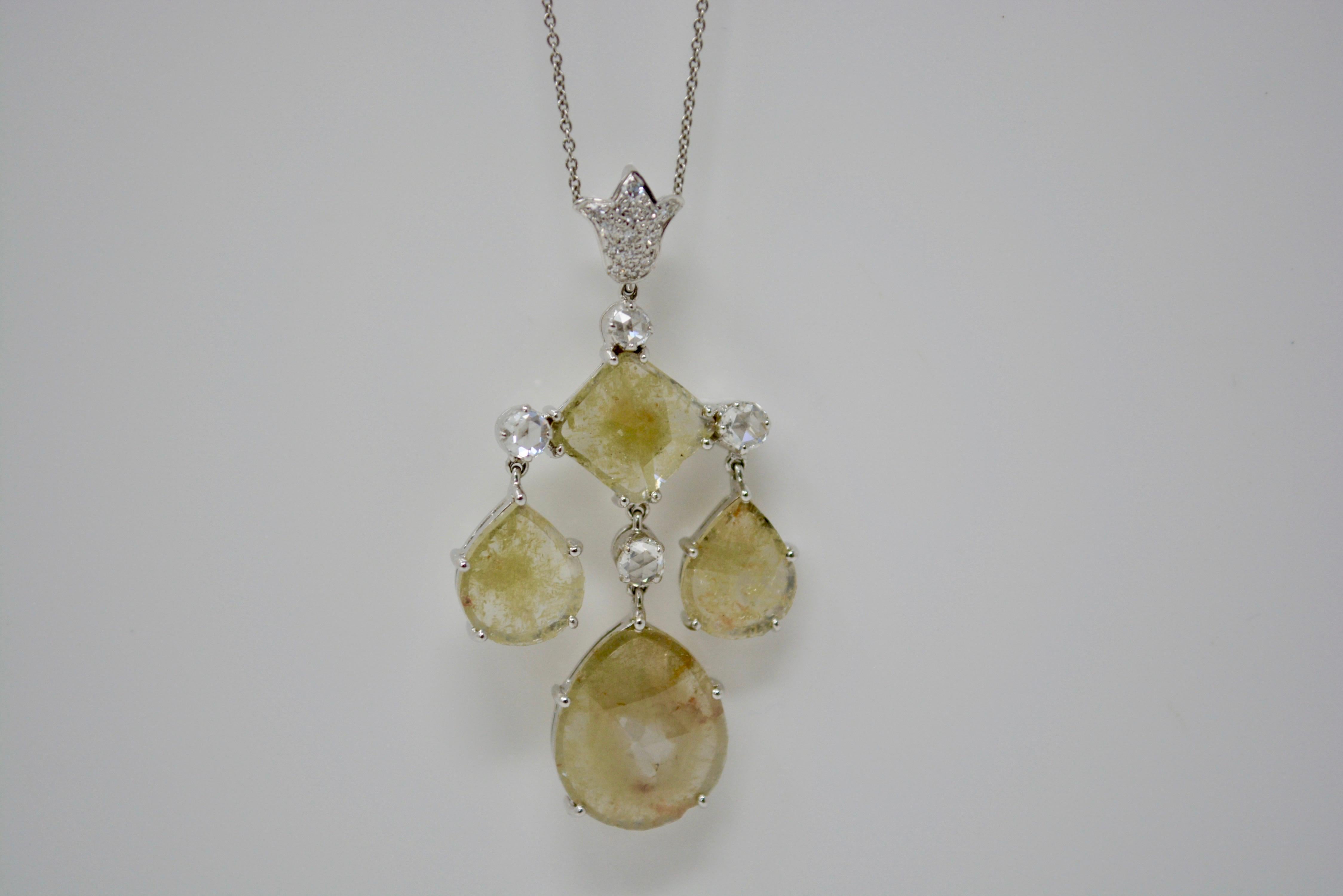 This beautiful necklace features 5.72 carat of natural yellow diamonds cut in slices for big look, light weight , brightness and shine. This unique necklace also includes white small single cut diamonds weighing 0.08 carat and white rose cut