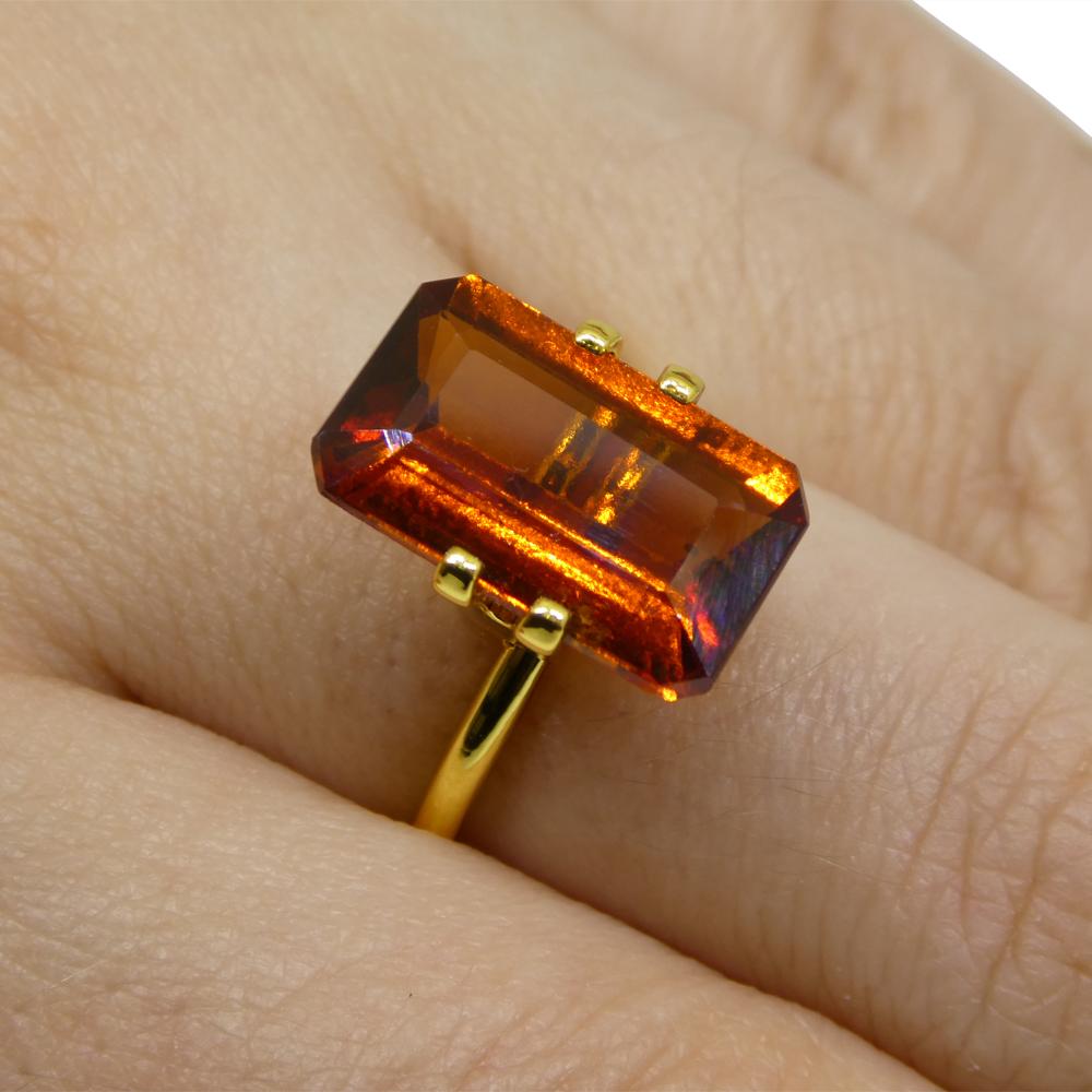 Description:

Gem Type: Hessonite Garnet
Number of Stones: 1
Weight: 6.13 cts
Measurements: 14.41 x 8.92 x 4.83 mm
Shape: Emerald Cut
Cutting Style Crown: Step Cut
Cutting Style Pavilion: Step Cut
Transparency: Transparent
Clarity: Very Slightly