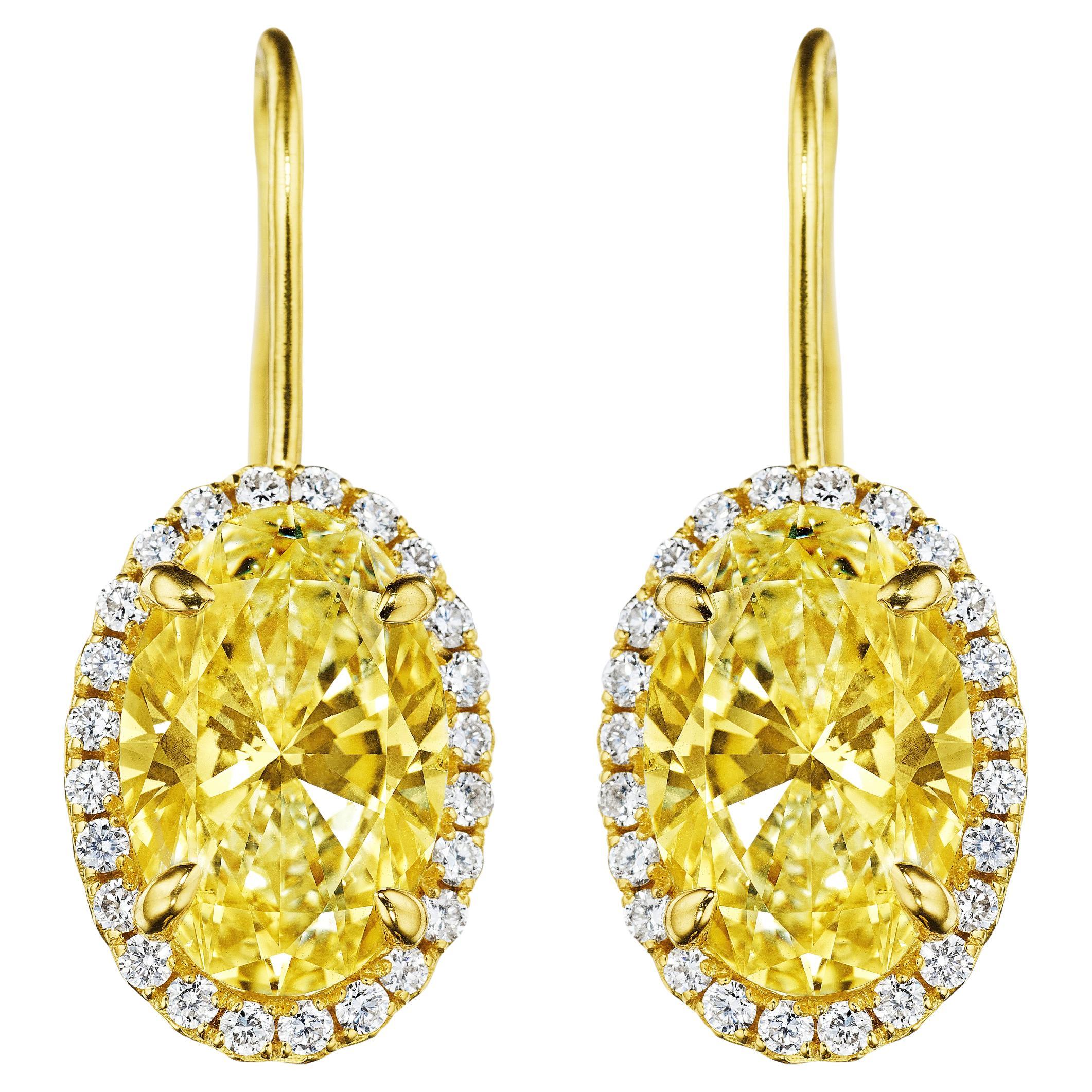 6.13ct GIA Certified Oval Yellow Diamond Earrings in 18KT Gold