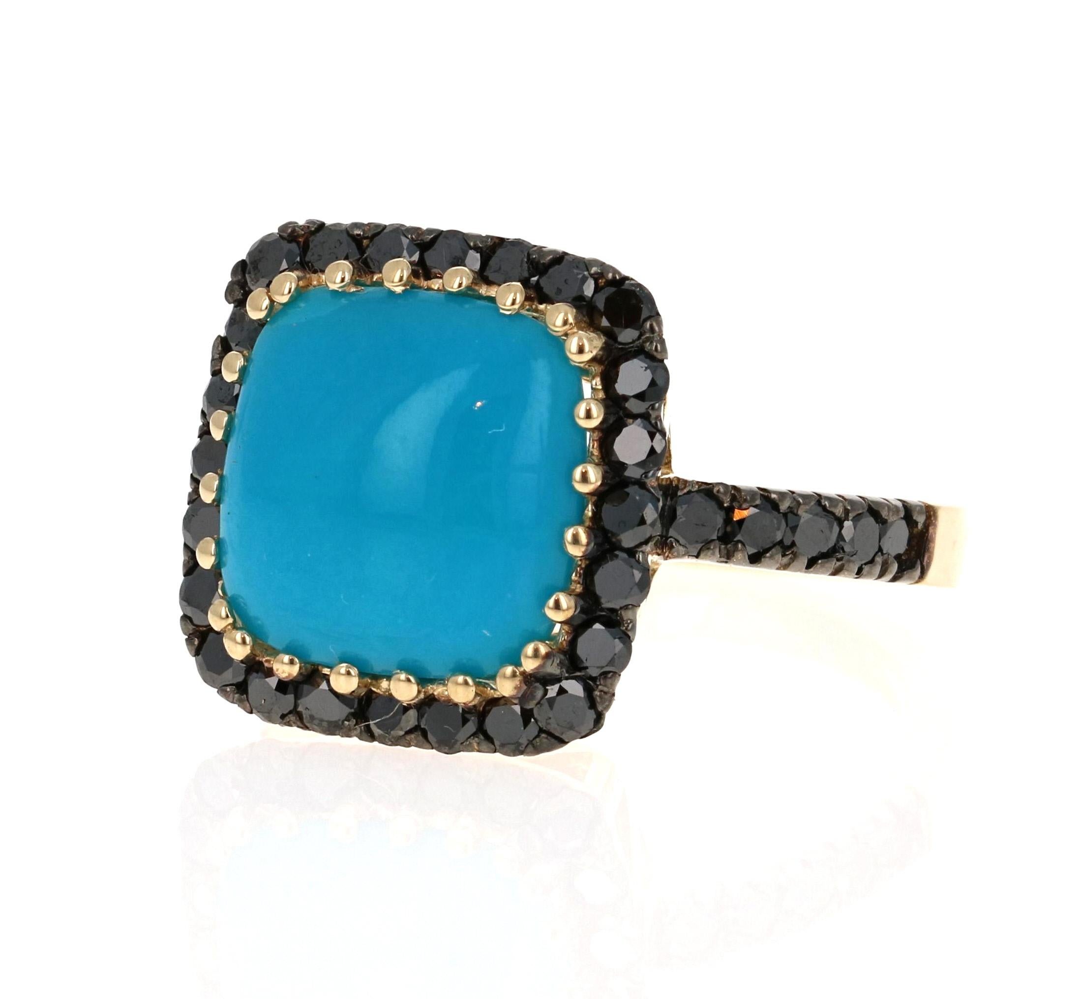 A unique stunner! 

This ring has a 5.10 Carat Cushion Cut Turquoise and is surrounded by 34 Black Round Cut Diamonds that weigh 1.04 Carats. The total carat weight of the ring is 6.14 Carats.   The turquoise measurements are 11mm x 11mm.

The ring
