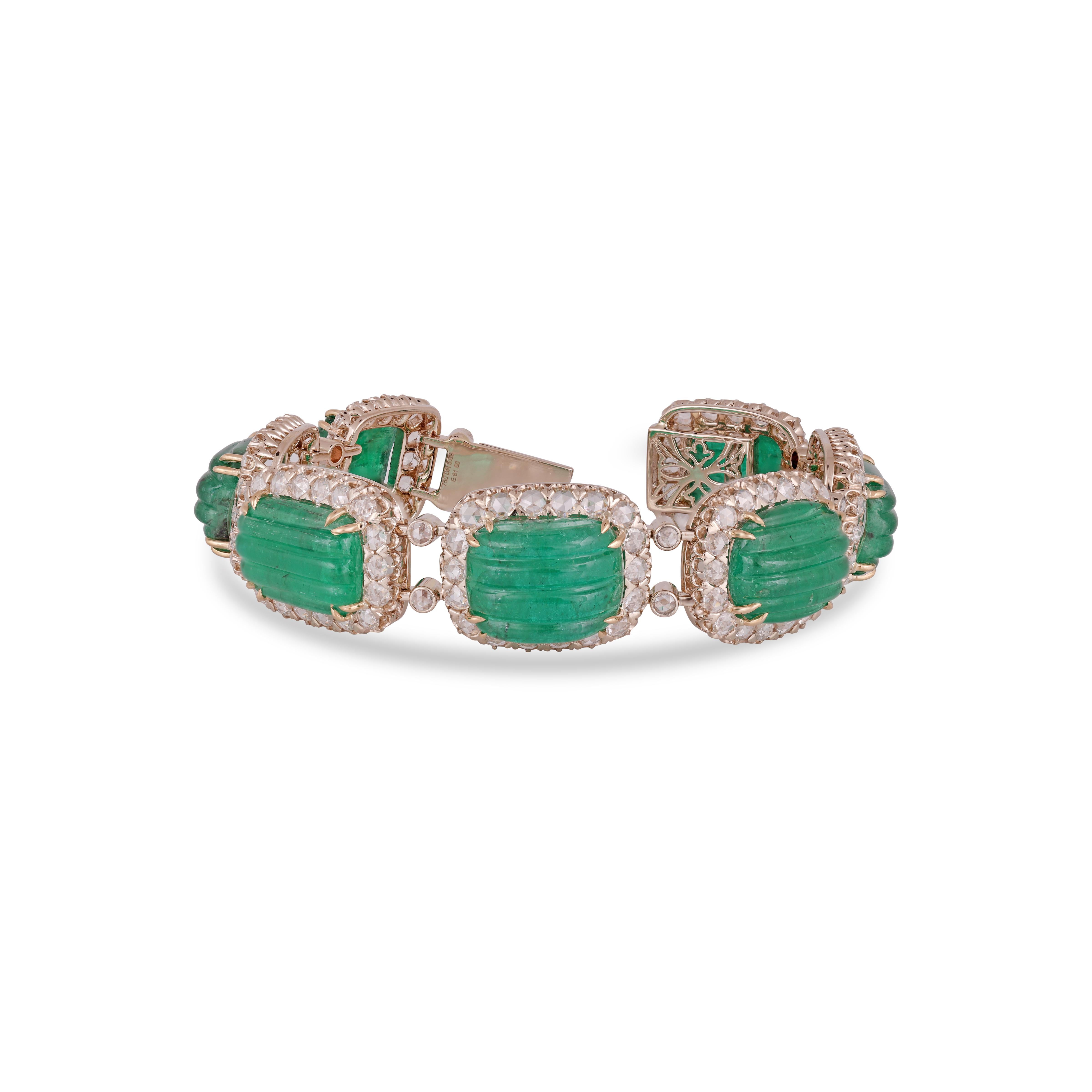 61.5 Carat Carved Emerald & Diamonds Bracelet 18K Yellow Gold


A very beautiful and dainty Emerald  Bracelet let in 18K  Yellow Gold & Diamonds. The weight of the Emerald is 61.5 carats. The weight of the Diamonds is 5.69 carats. Net Gold weight is