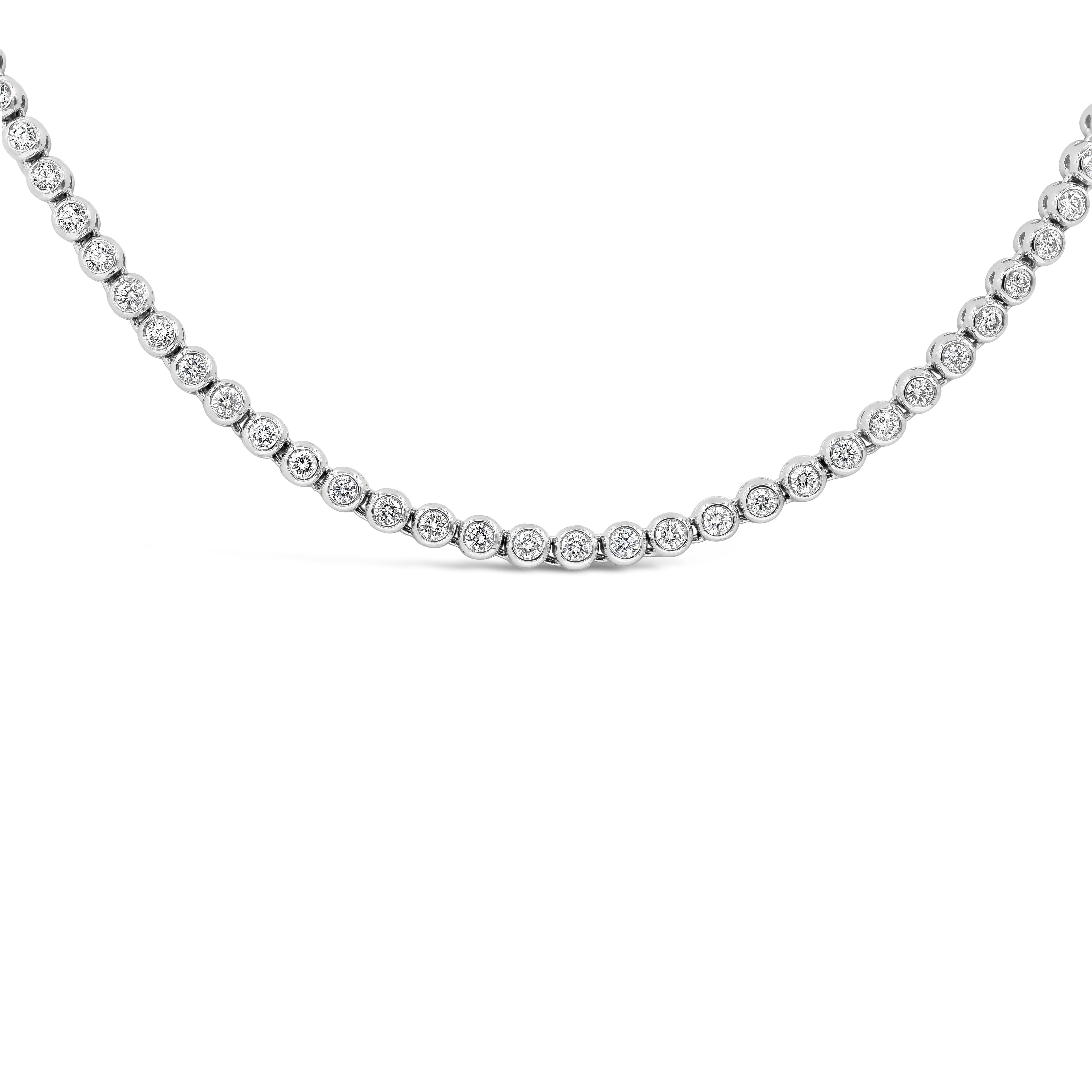 A versatile tennis necklace for casual, everyday wear or to compliment a formal style. Showcases round brilliant diamonds set in a 14 karat white gold bezel. Diamonds weigh 6.03 carats total. 16 inches in length. 

Style available in different price