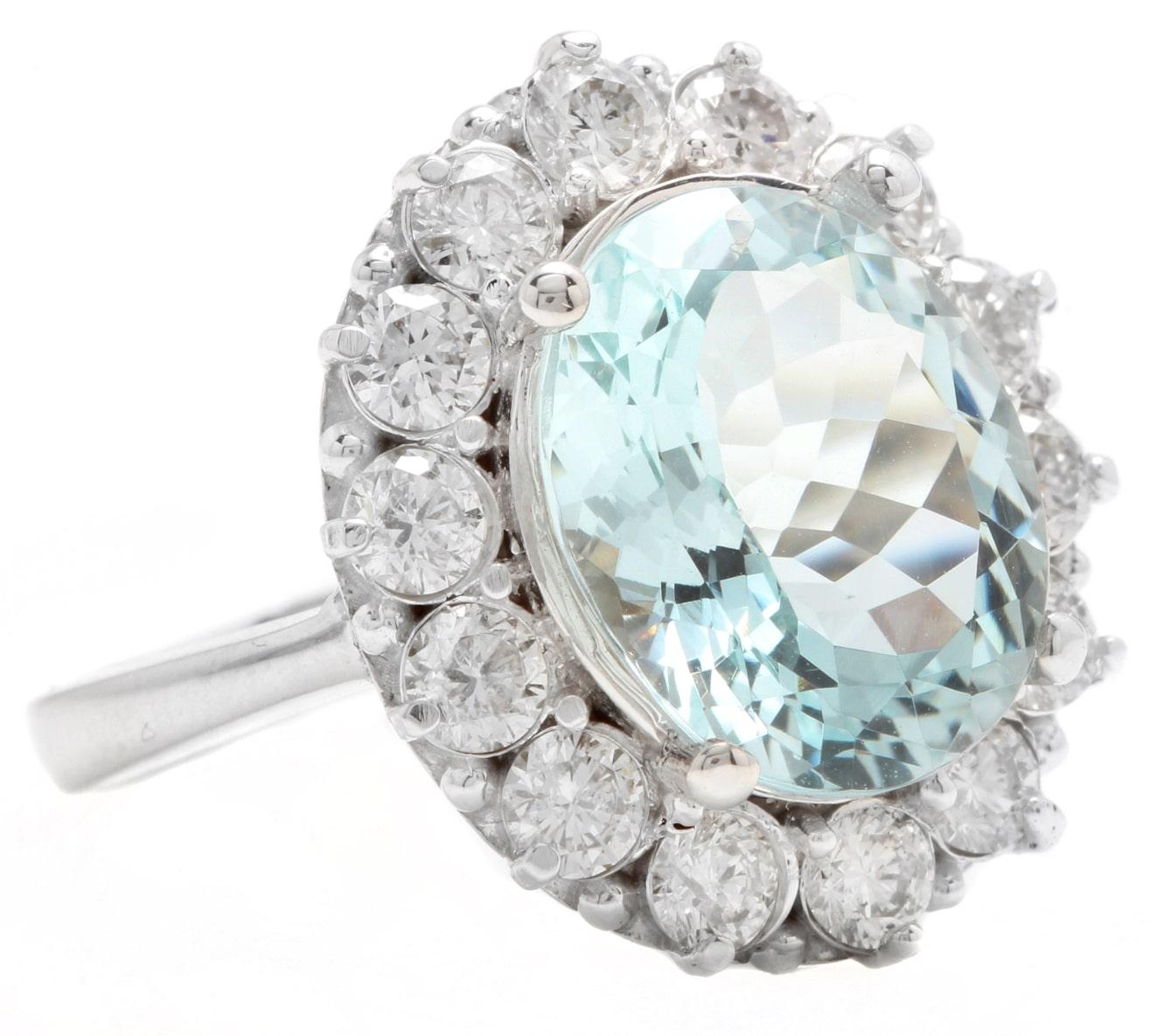 6.15 Carats Natural Aquamarine and Diamond 14K Solid White Gold Ring

Suggested Replacement Value: $5,500.00

Total Natural Oval Cut Aquamarine Weights: 5.00 Carats 

Aquamarine Measures: 12.00 x 10.00mm

Natural Round Diamonds Weight: 1.15 Carats