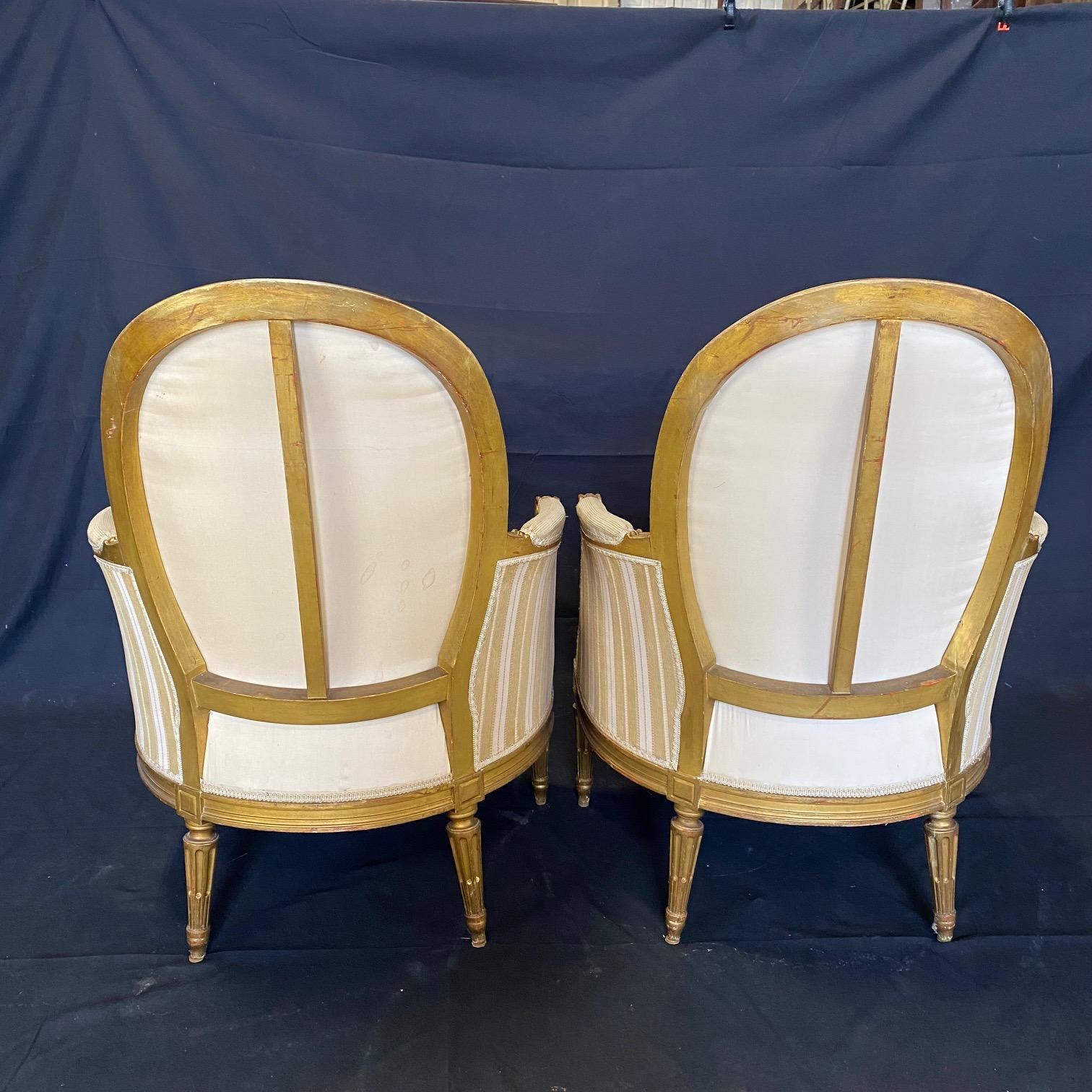 #6158, 19th Century Pair of Rare French Louis XVI Bergeres Chairs with Original 4
