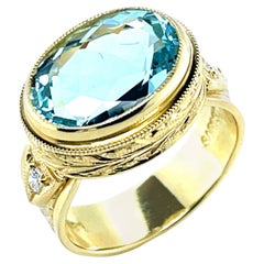 6,16 Karat Aquamarin in 18 Karat Gelbgold, handgravierter Ring mit Diamanten