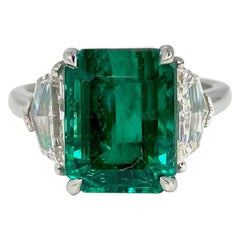 GIA Certified 6.16 Carat Green Emerald with 2 Half Moon Diamonds