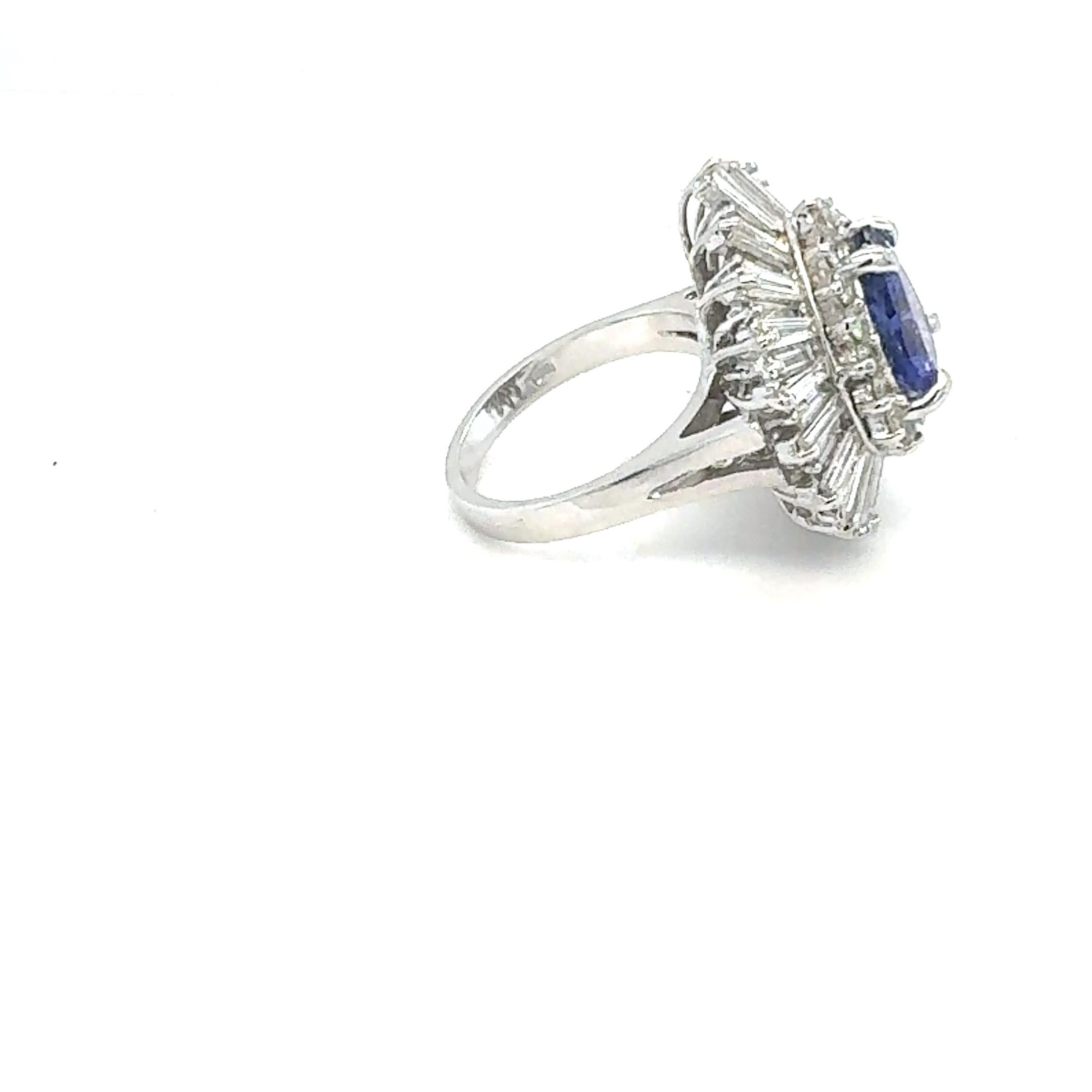 6.16 Carat Pear Cut Tanzanite Diamond 14 Karat White Gold Cluster Ring

This ring has a electrifying Pear Cut bright purplish blue Tanzanite weighing 3.17 Carats. The beautiful tanzanite is surrounded by a cluster of 41 Baguette Cut Diamonds that