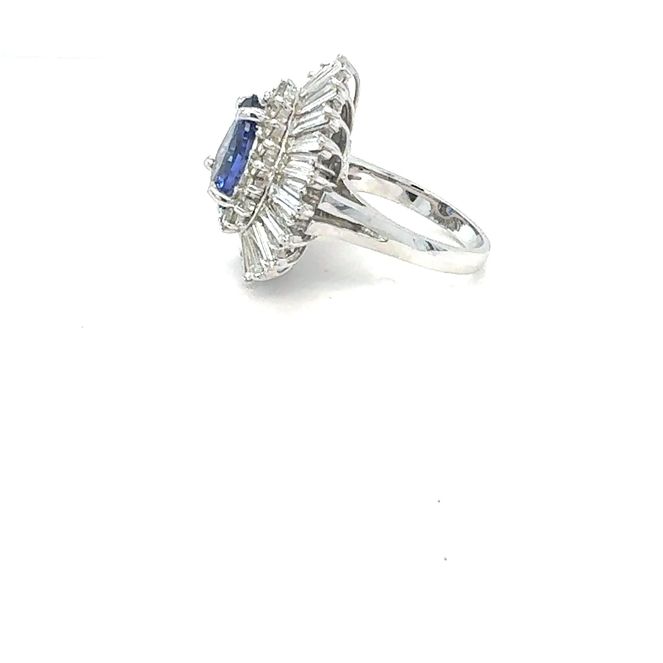 Contemporary 6.16 Carat Pear Cut Tanzanite Diamond 14 Karat White Gold Cluster Ring For Sale