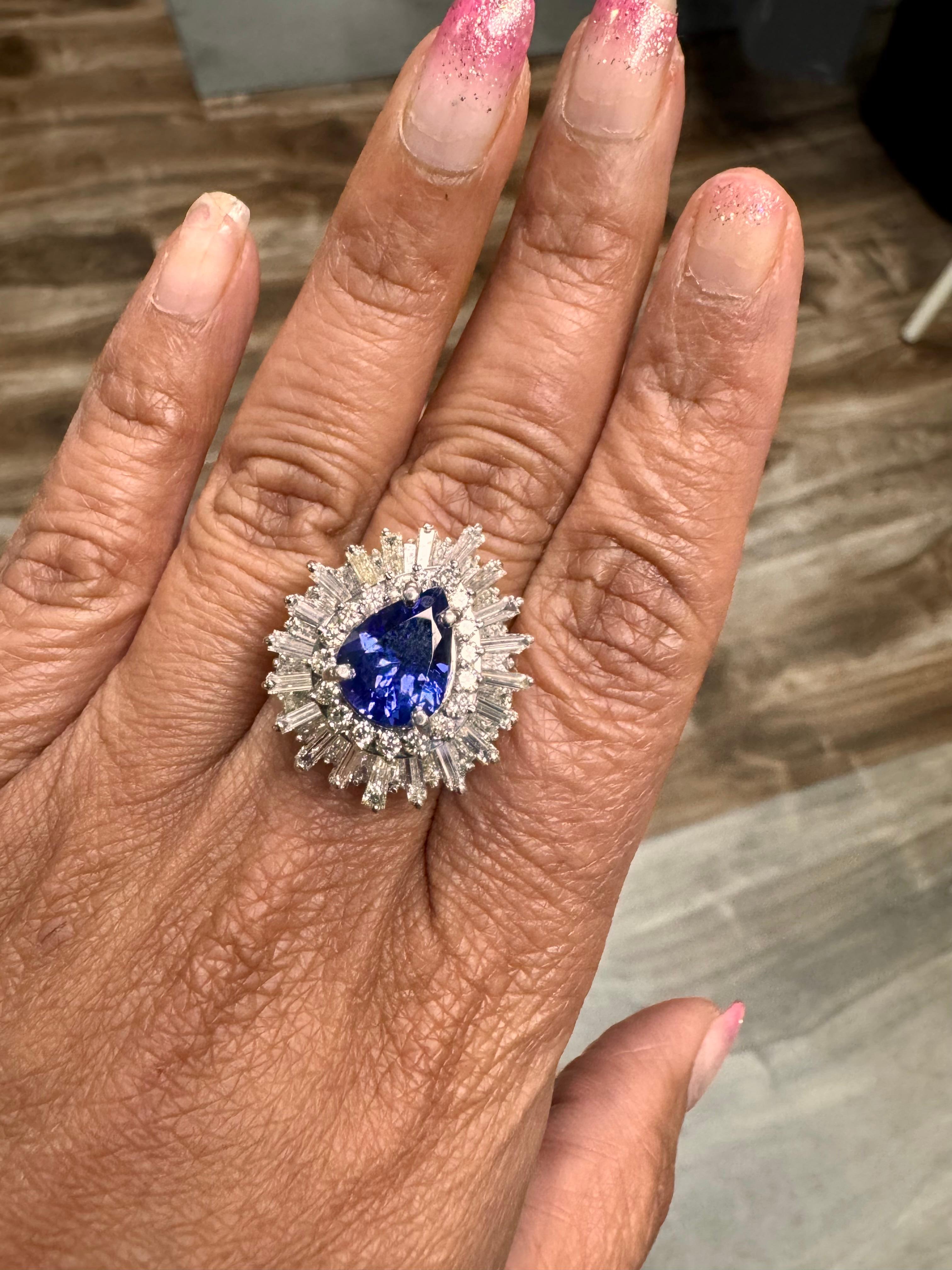 Women's 6.16 Carat Pear Cut Tanzanite Diamond 14 Karat White Gold Cluster Ring For Sale
