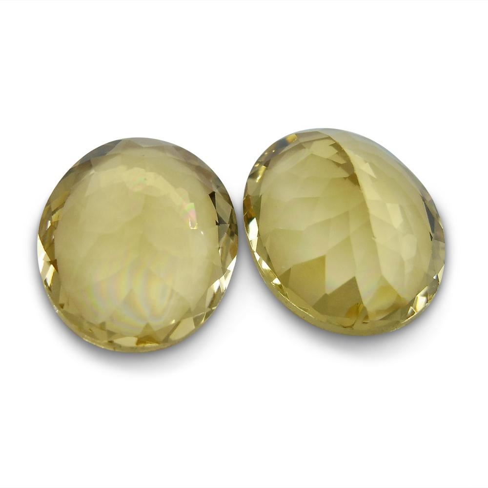 Women's or Men's 6.16 ct Pair Oval Heliodor/Golden Beryl CGL-GRS Certified For Sale