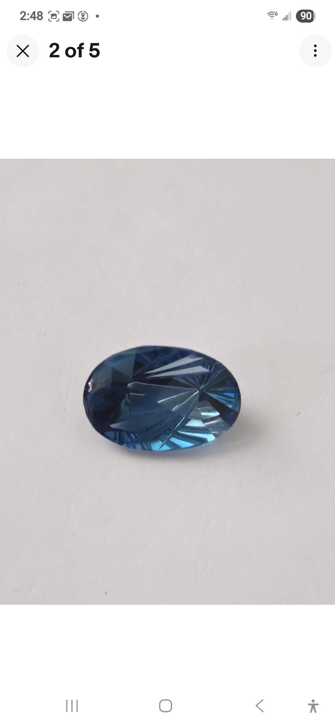 Taglio ovale 6.17 ct Oval London Blue Topaz 14X10 Fantasy Cut in vendita