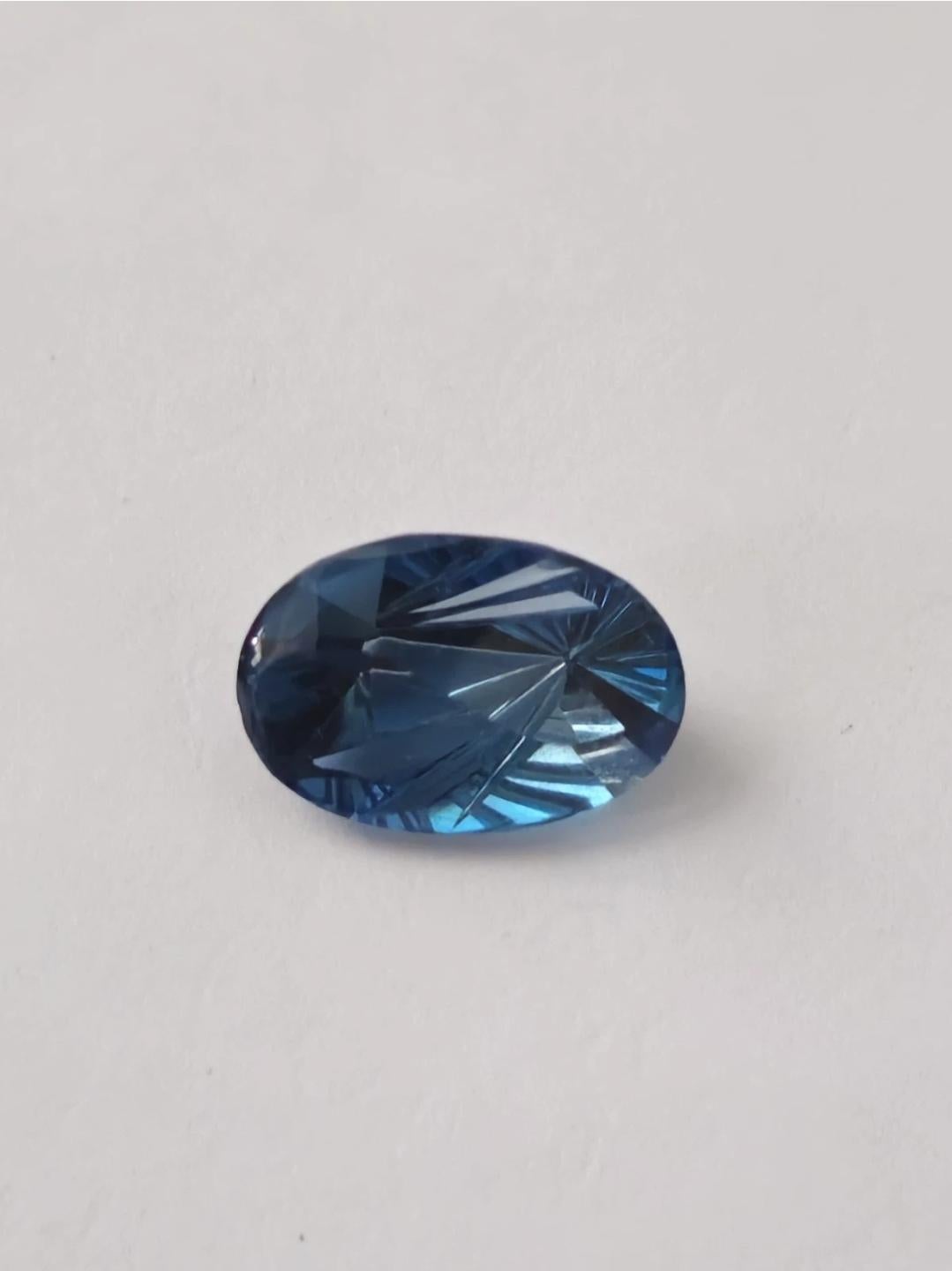 6.17 ct Oval London Blue Topaz 14X10 Fantasy Cut In condizioni Nuovo in vendita a Warren, NJ