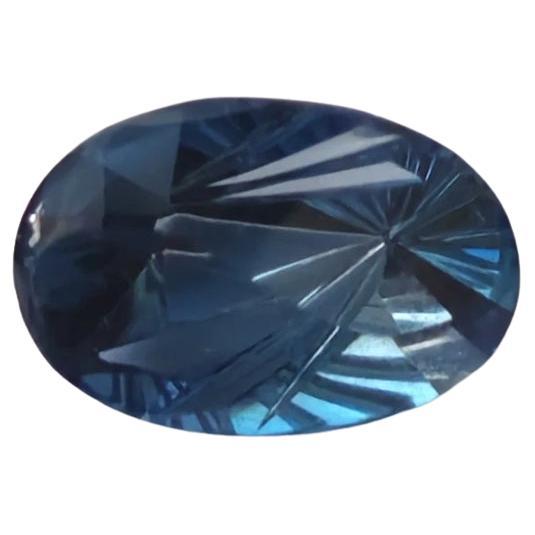6.17 ct Oval London Blue Topaz 14X10 Fantasy Cut
