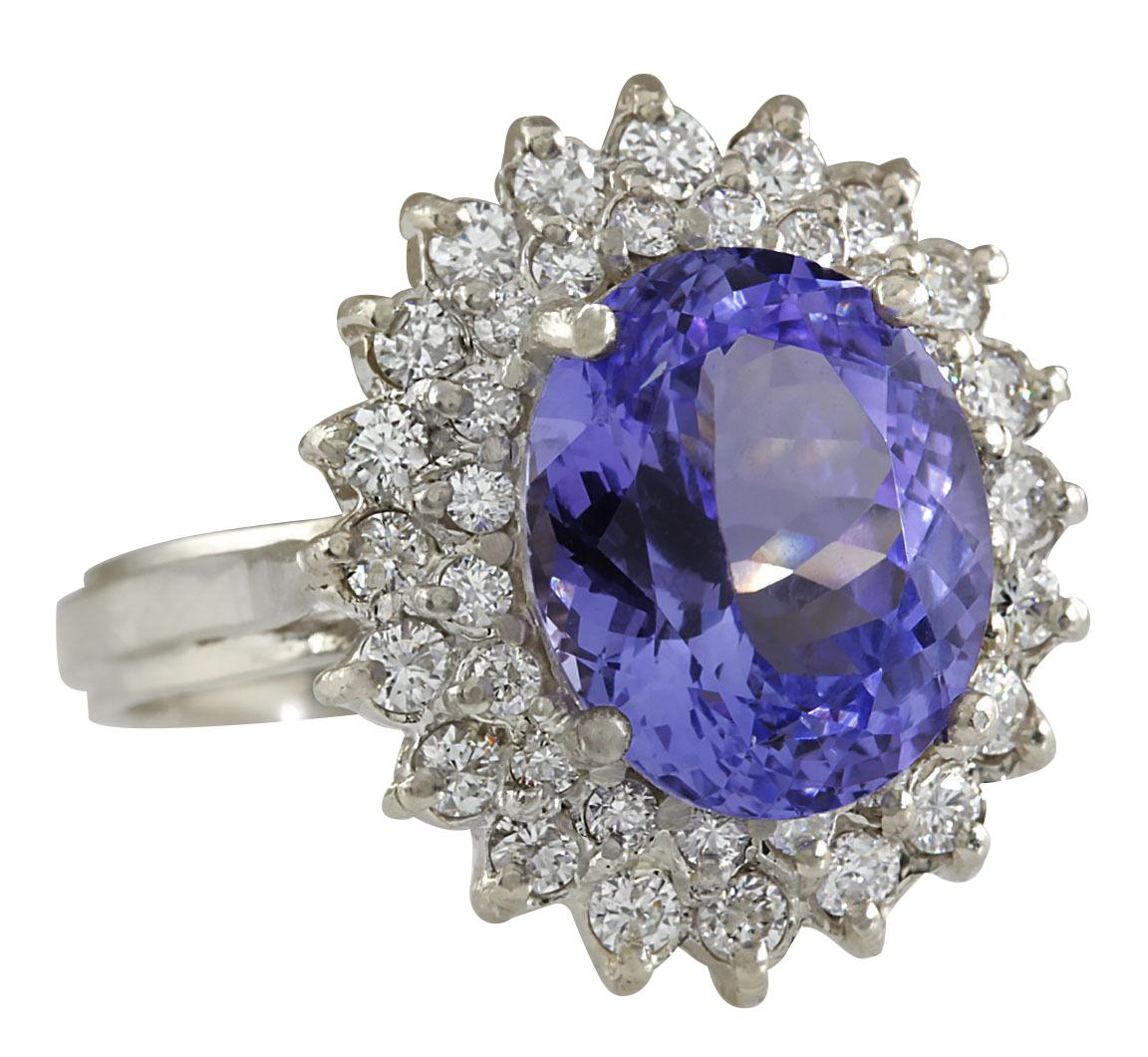 Presenting our exquisite 6.18 Carat Natural Tanzanite 14 Karat White Gold Diamond Ring. Crafted with precision and elegance, this ring is stamped with authenticity, ensuring its quality. Weighing 7.3 grams in total, it's both substantial and