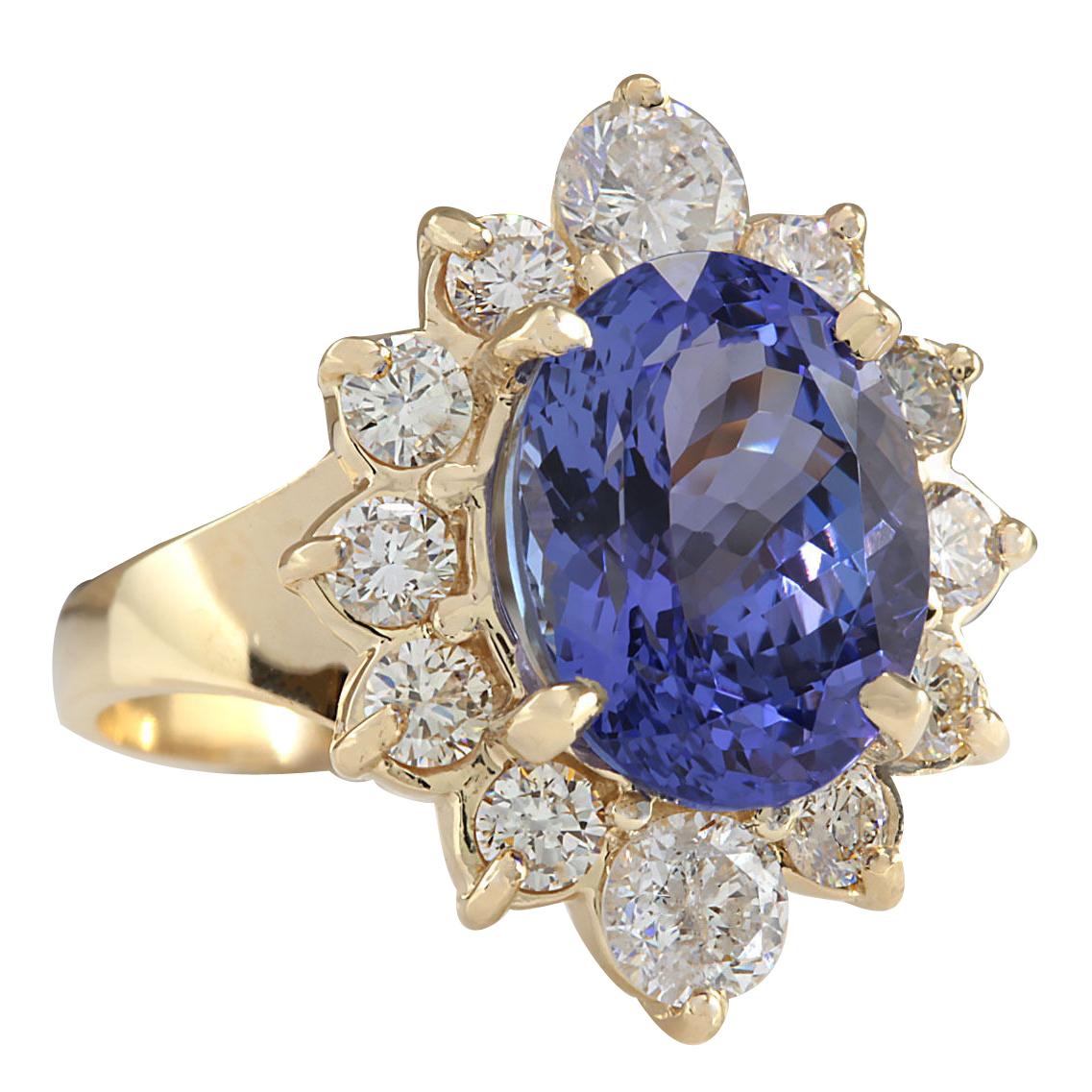 Behold the elegance of our 6.18 Carat Tanzanite 14 Karat Yellow Gold Diamond Ring. Impeccably crafted and stamped with 14K yellow gold, this masterpiece boasts a total ring weight of 6.6 grams. The centerpiece is a mesmerizing 4.93-carat tanzanite,