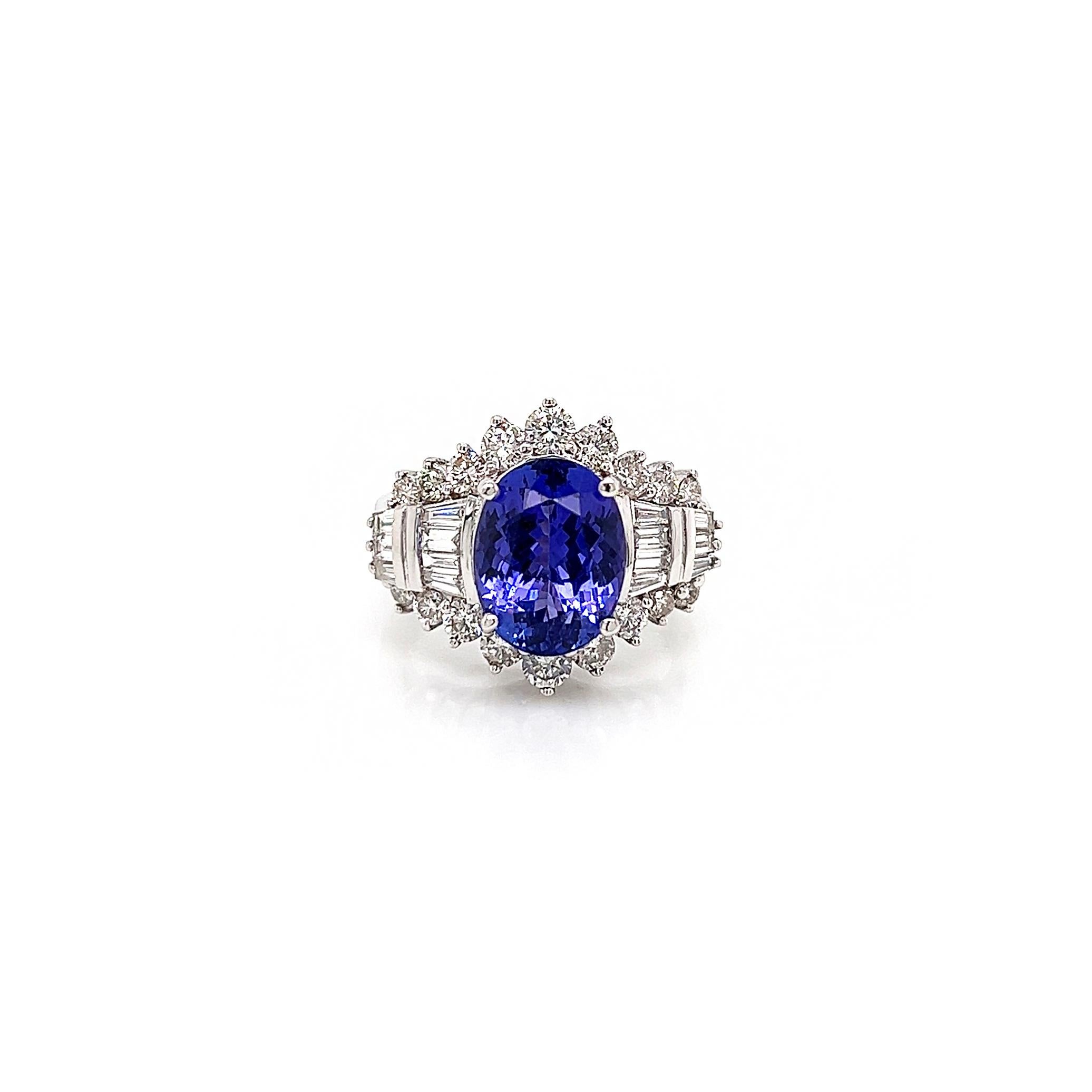 6.18 Total Carat Tanzanite and Diamond Ladies Engagement Ring in 14K White Gold
One look is all it takes to fall in love with this mesmerizing tanzanite engagement ring.

-Metal Type: 14K White Gold
-4.60 Carat Oval Cut Natural Tanzanite
-1.58 Carat