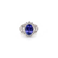 Anello di fidanzamento da donna con tanzanite e diamante da 6,18 carati totali in oro bianco 14K