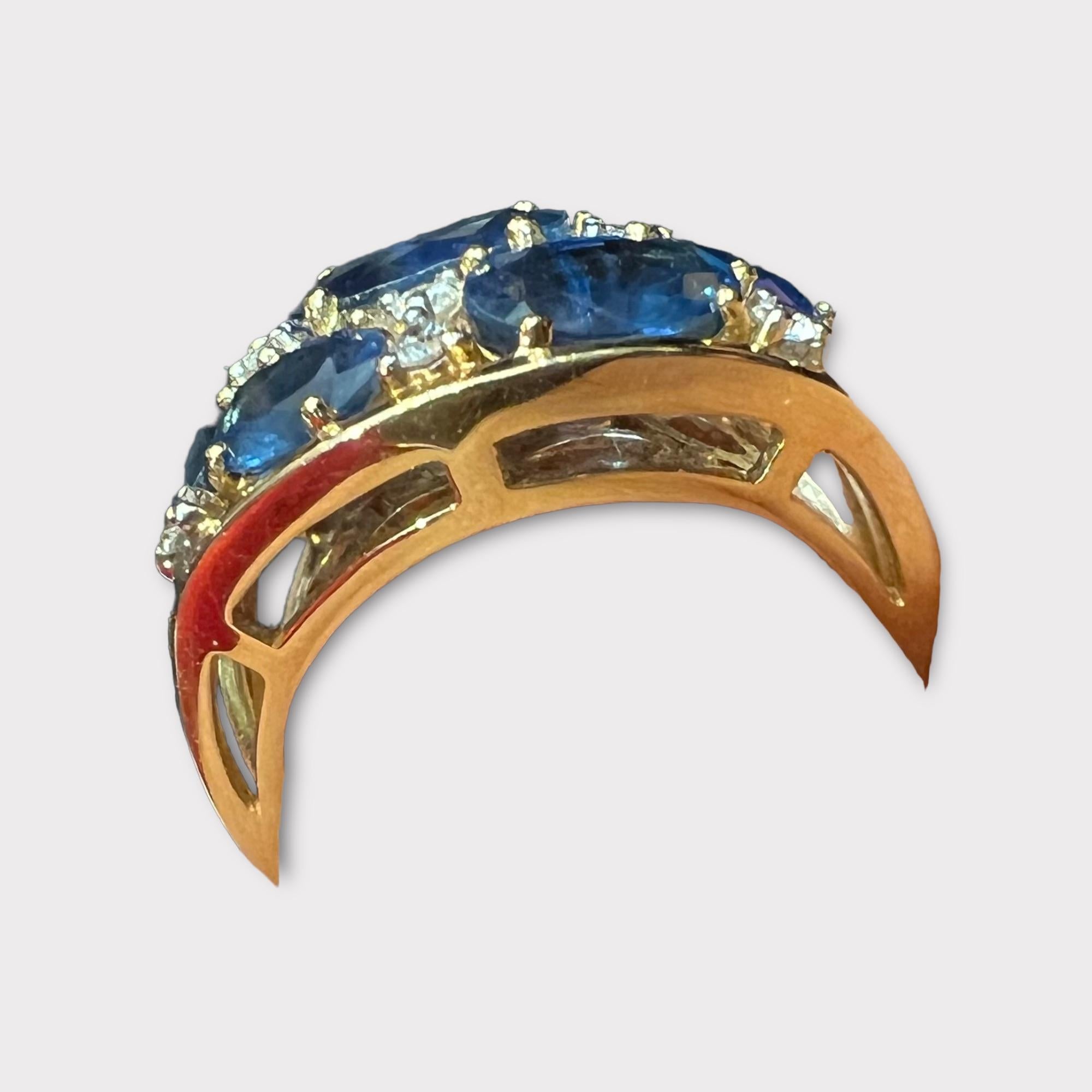  18 carat yellow gold cocktail ring , set with 7 sapphires totaling 6,19 carats, paved with 0,21 carat of brilliants
total weight of the ring: 6.94 grams
ring size: 52 or 6