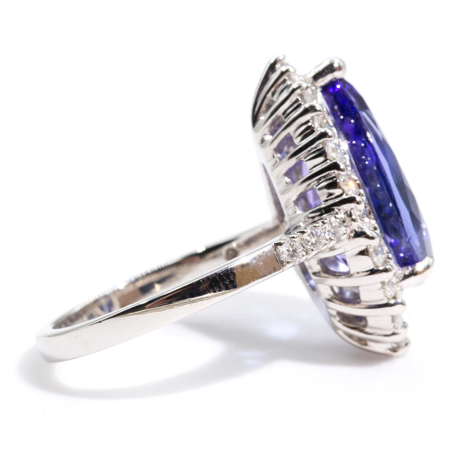 Contemporary 6.19 Carat Pear Tanzanite with 0.86 Carats Round Diamond Platinum Cocktail Ring For Sale
