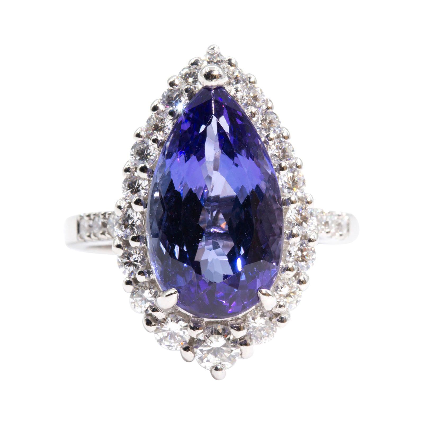 6.19 Carat Pear Tanzanite with 0.86 Carats Round Diamond Platinum Cocktail Ring For Sale