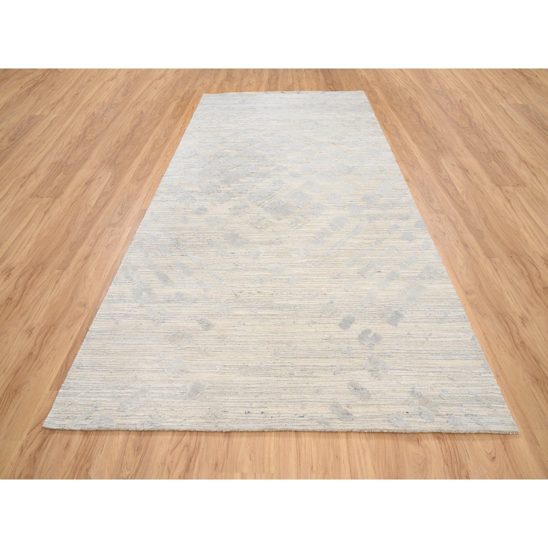 This is a truly genuine one-of-a-kind Hand Spun Undyed Natural Wool Hand Knotted Ivory Modern Design Oriental Wide Gallery Size Runner Rug. It has been Knotted for months and months in the centuries-old weaving craftsmanship techniques by expert