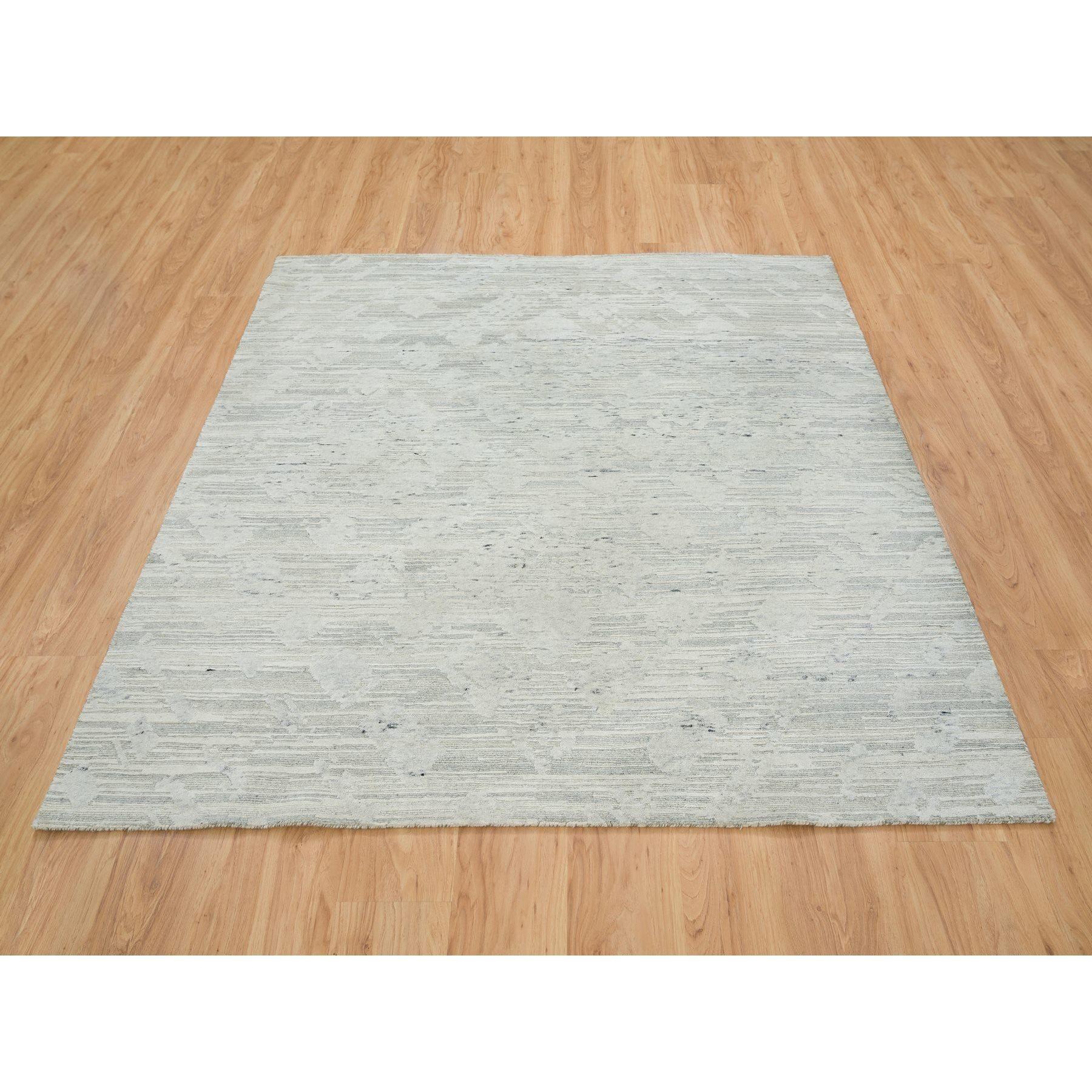 This is a truly genuine one-of-a-kind Modern and Contemporary, Hand Knotted, Hand Spun, Wool, Oriental Rug.  It has been Knotted for months and months in the centuries-old weaving craftsmanship techniques by expert artisans.
Primary materials: