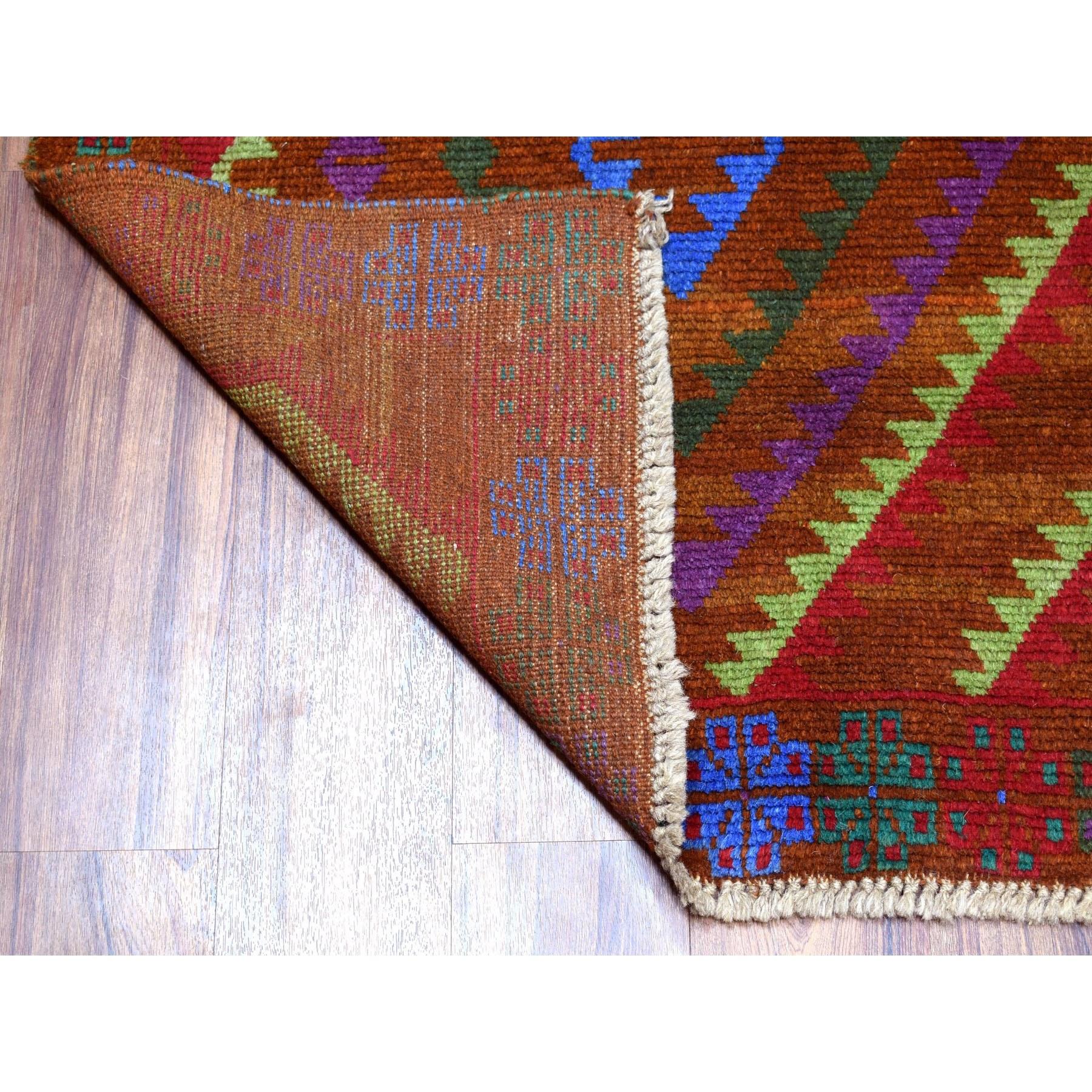 This is a truly genuine one-of-a-kind Brown Colorful Afghan Baluch Geometric Design Hand Knotted 100% Wool Oriental Rug. It has been woven for months and months in the centuries-old Persian weaving craftsmanship techniques by expert